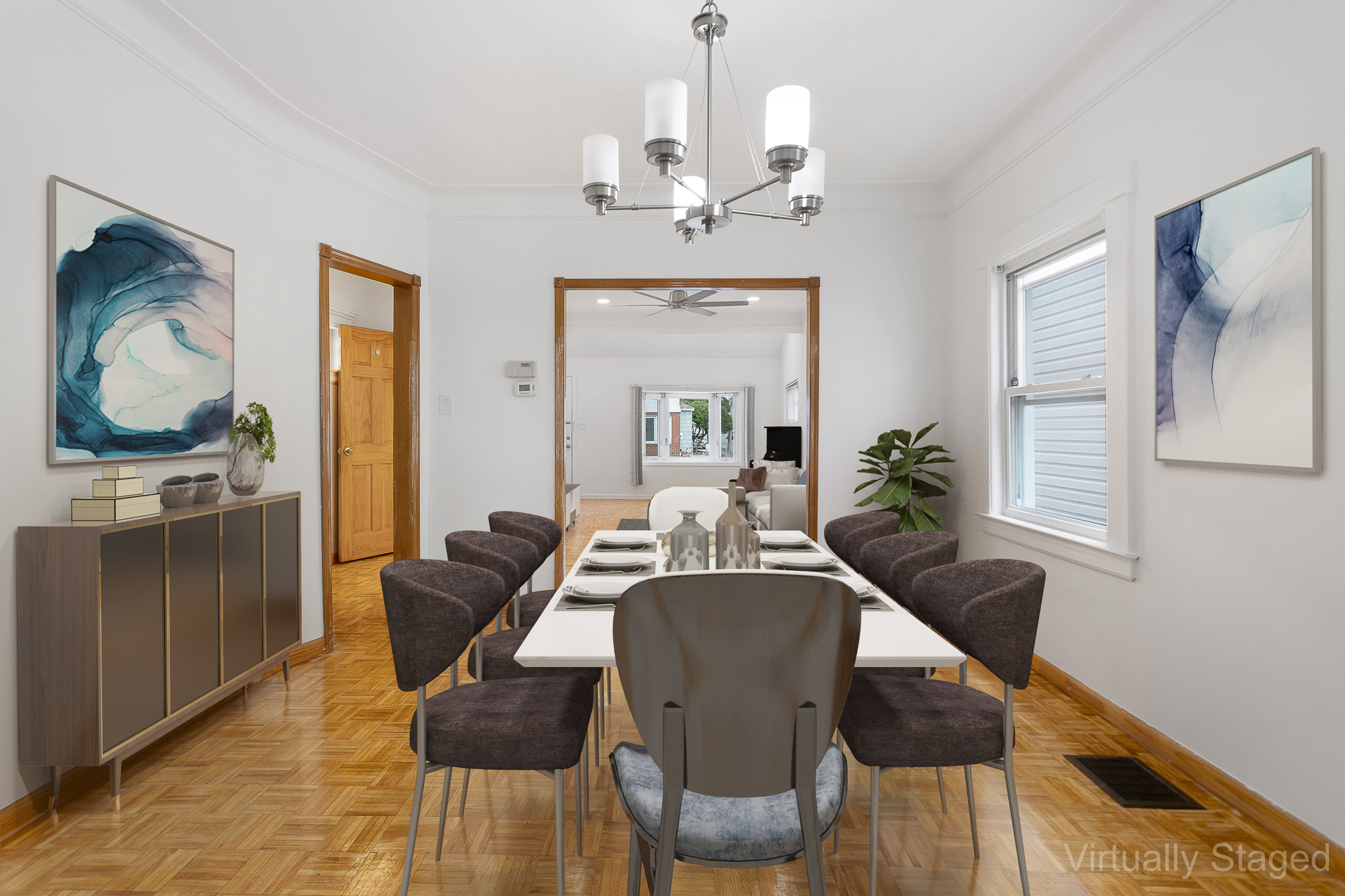 91-22 92nd Street Queens, NY 11421 - Photo 4 of 27 a view of a dining room with furniture wooden floor and a chandelier