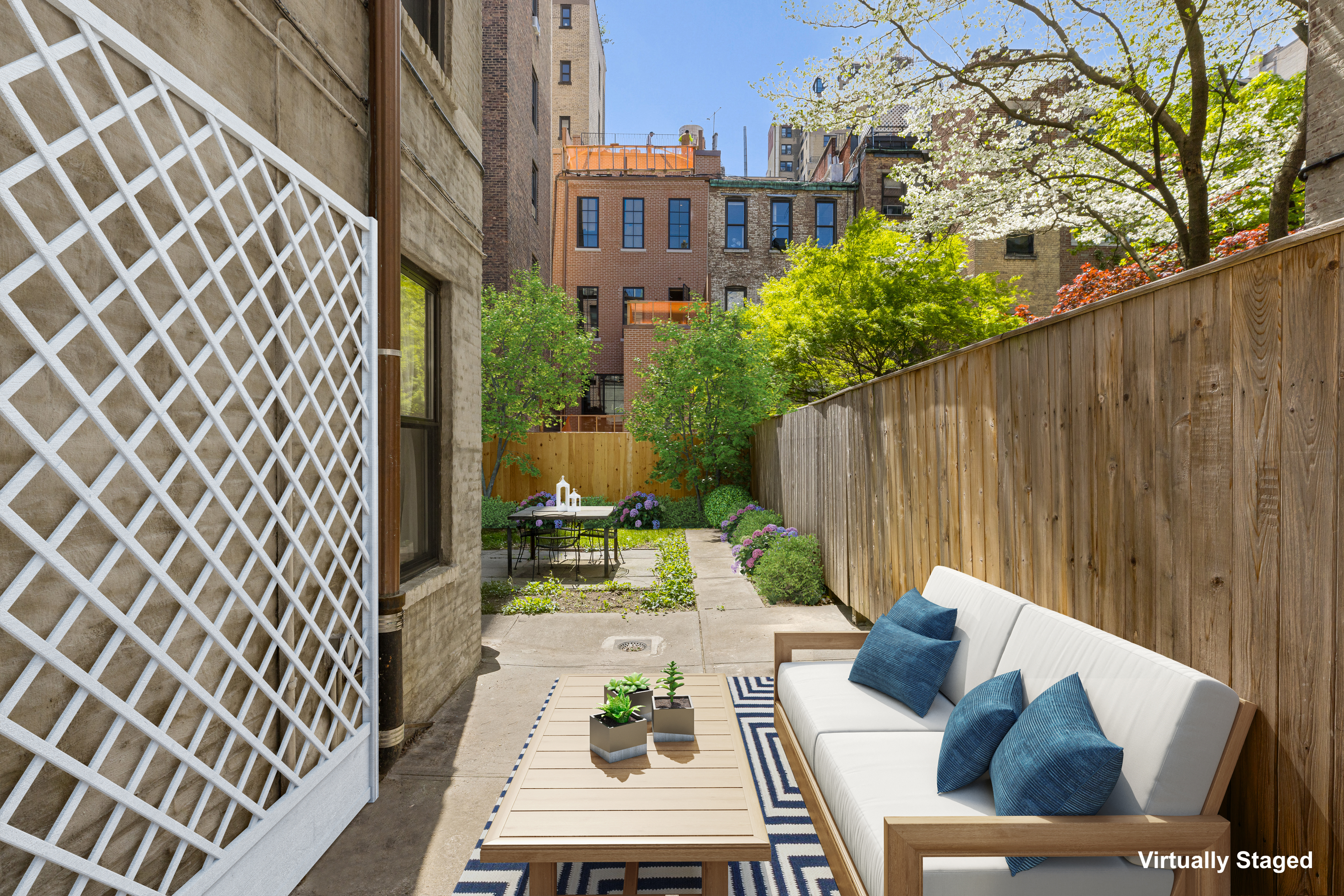 322 West 88th Street, Unit B Manhattan, NY 10024 - Photo 5 of 8 a view of a patio with couches table and chairs and potted plants