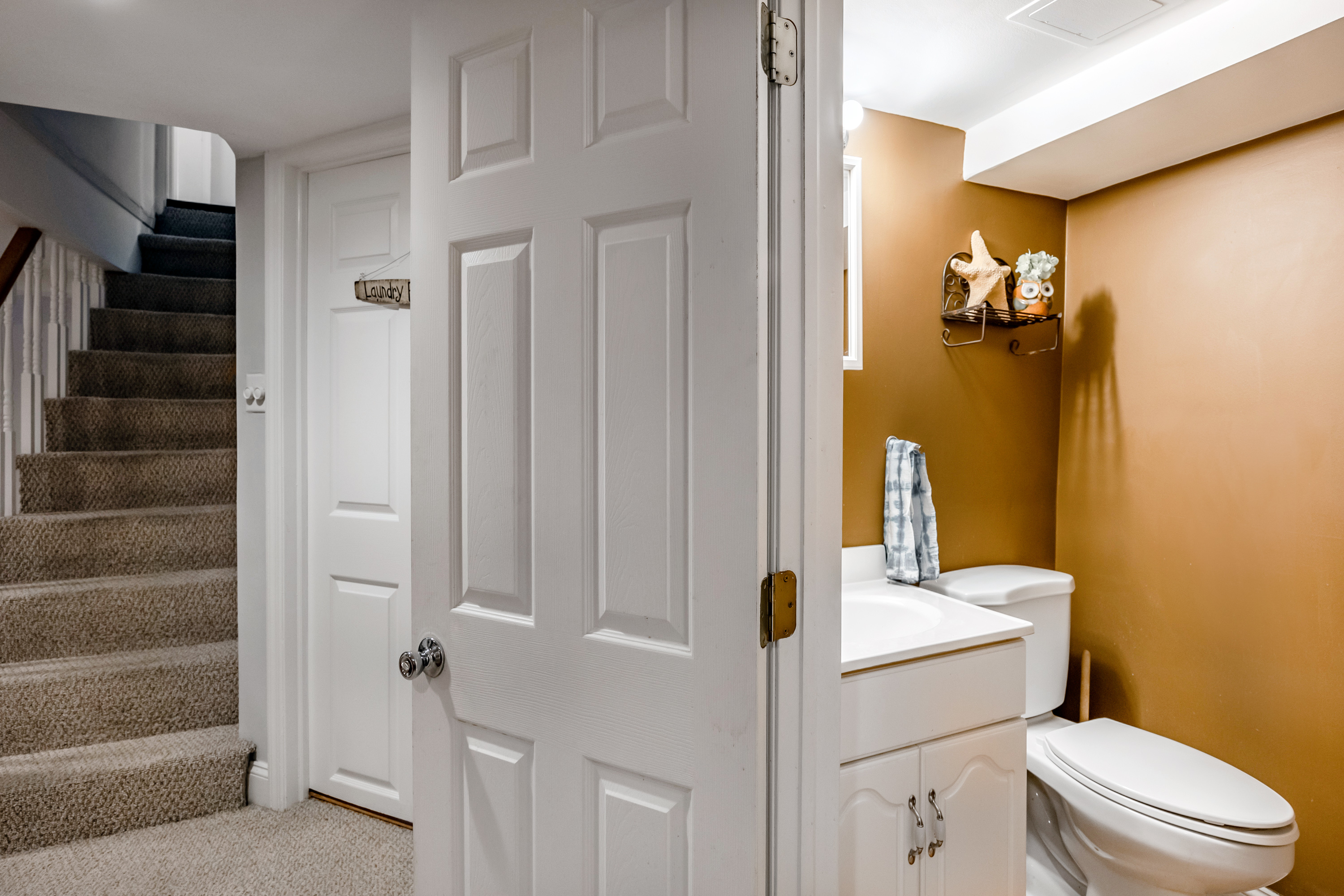 134 Strathmore Road Havertown, PA 19083 - Photo 54 of 64 a white toilet sitting next to a bathroom sink