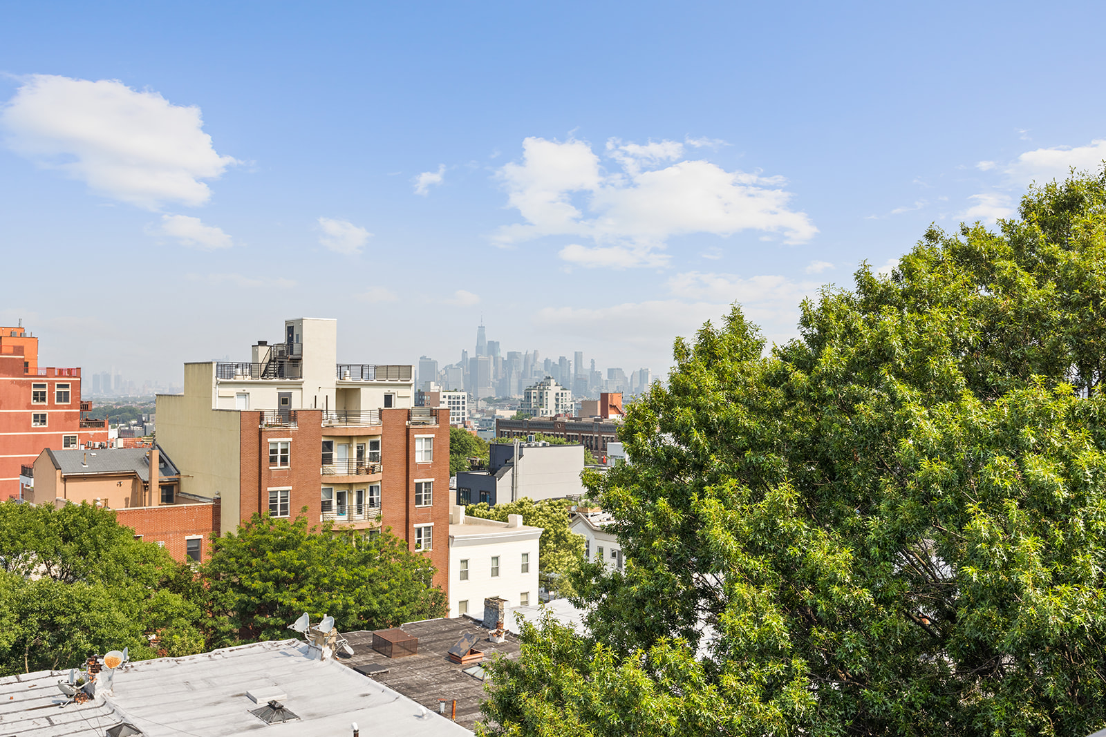 305 23rd Street, Unit 3W Brooklyn, NY 11215 - Photo 16 of 21 a view of a city with tall buildings