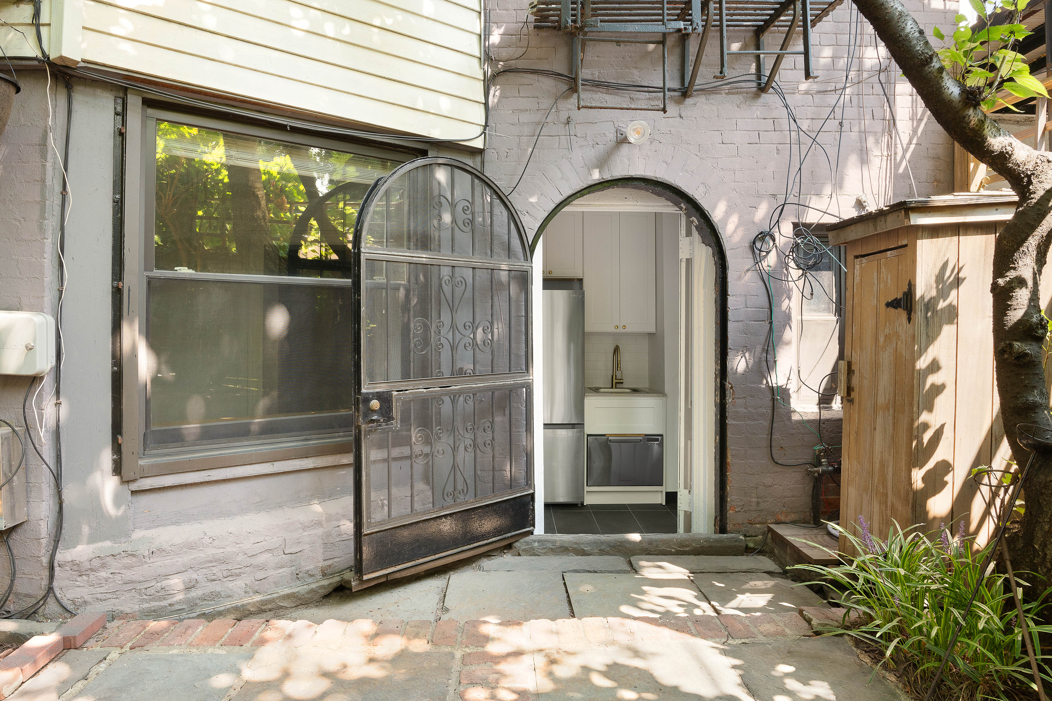 176 Warren Street, Unit GARDEN Brooklyn, NY 11201 - Photo 8 of 9 a view of entryway with a garden