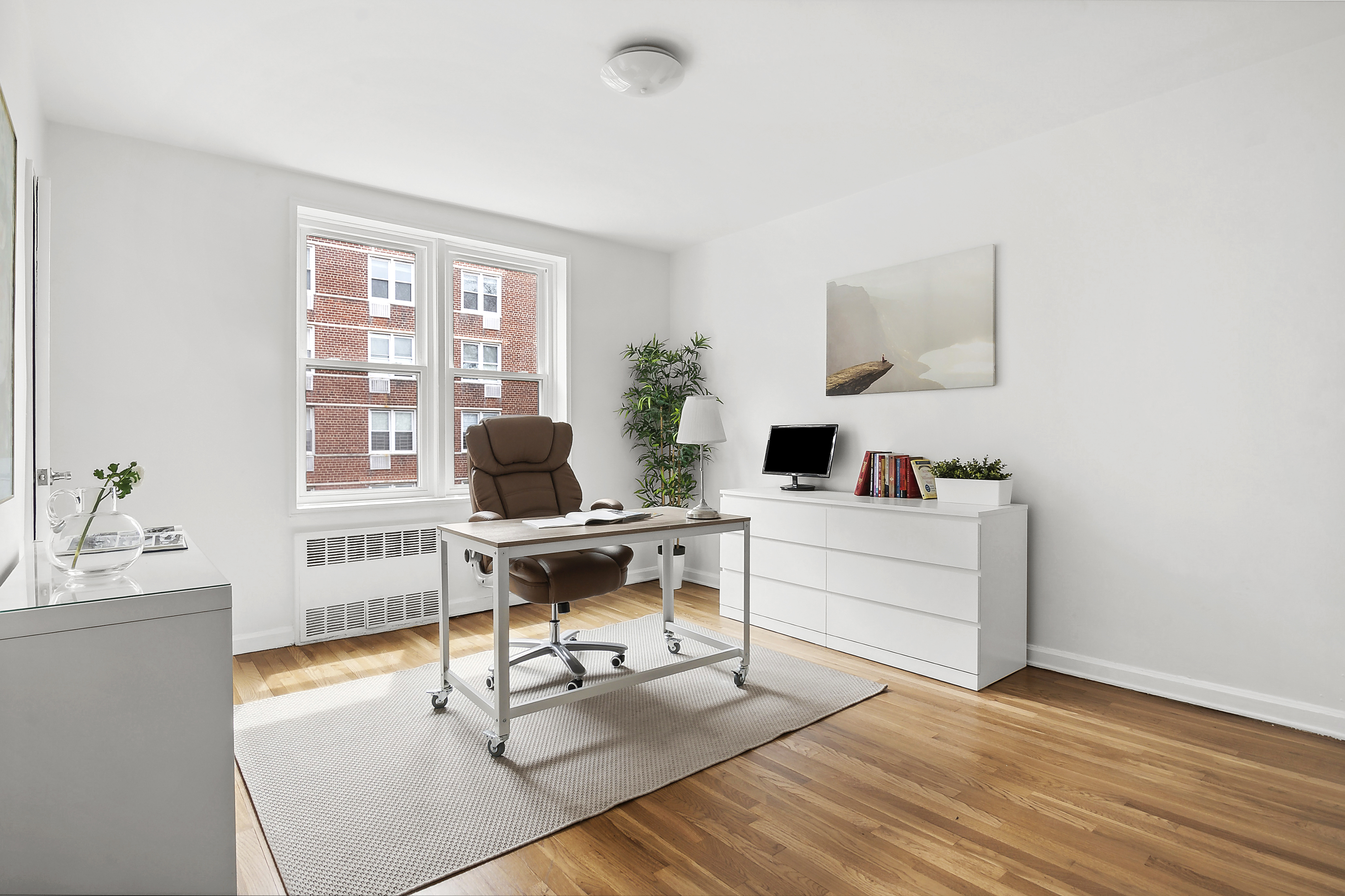 9201 Shore Road, Unit B301 Brooklyn, NY 11209 - Photo 7 of 12 a workspace with furniture and a window