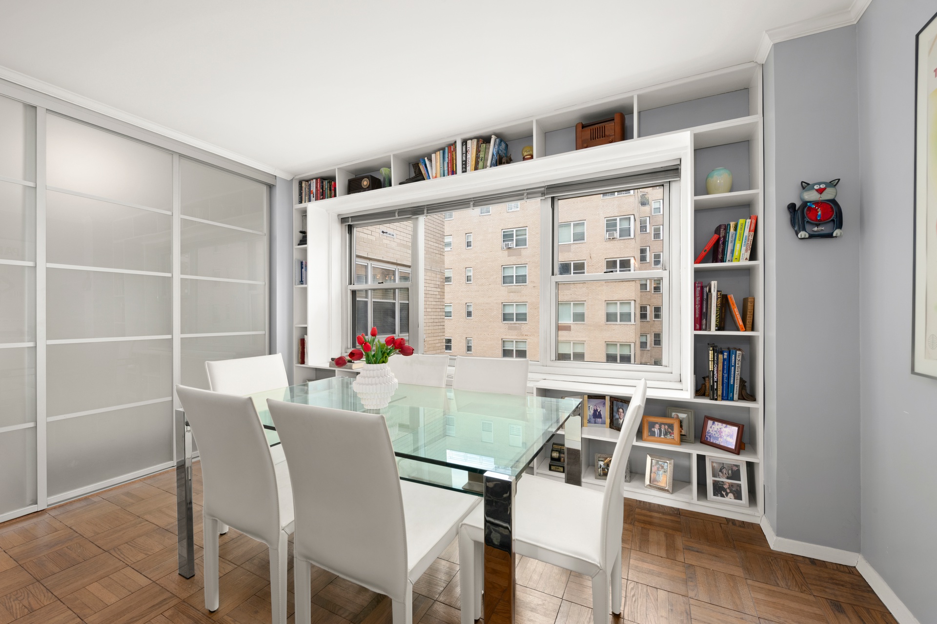 20 East 9th Street, Unit 9R Manhattan, NY 10003 - Photo 5 of 22 a view of a dining room with furniture and wooden floor