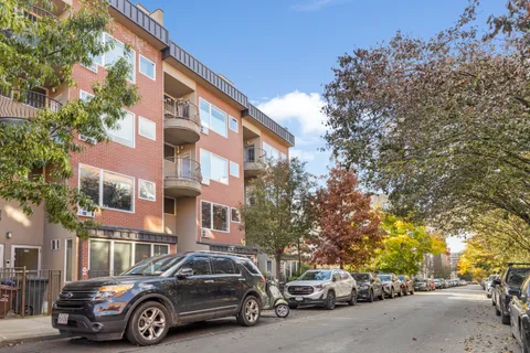 a car parked in front of a building