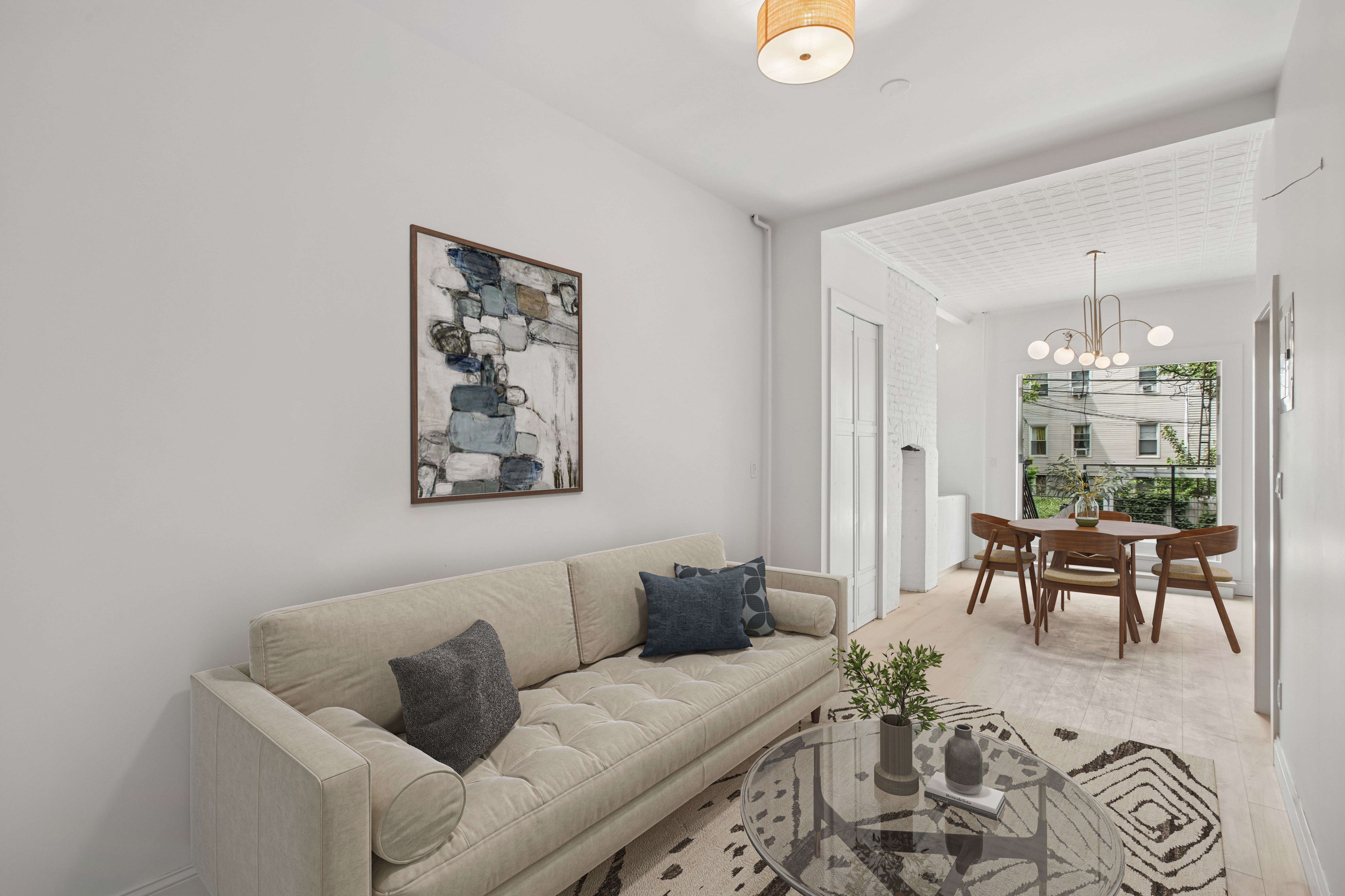 35 Jewel Street, Unit 1 Brooklyn, NY 11222 - Photo 6 of 11 a living room with furniture and a dining table