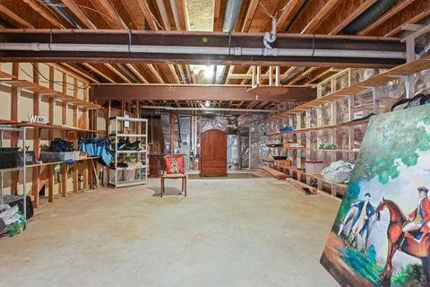 a view of balcony with wooden floor and fence