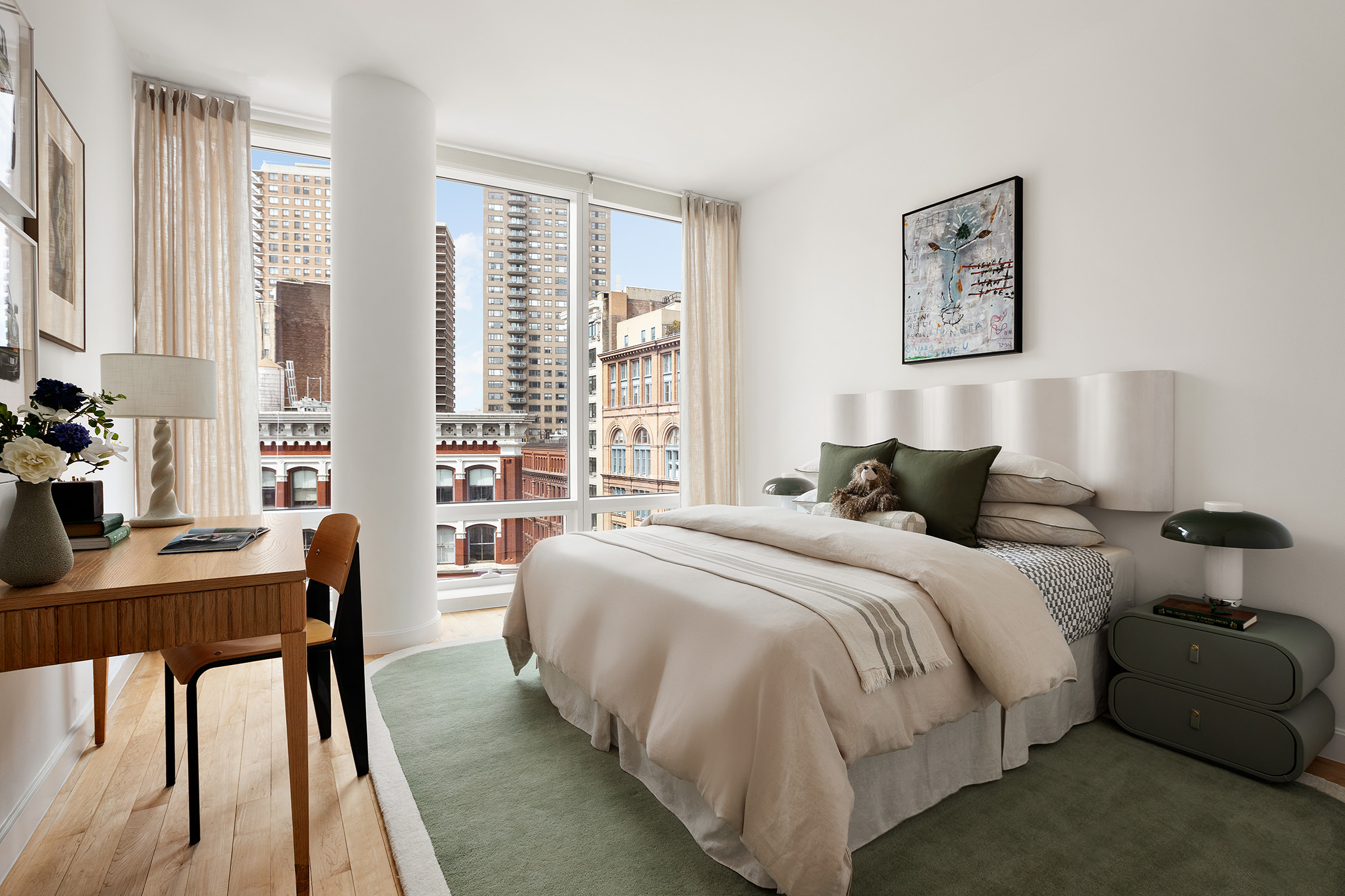 445 Lafayette Street, Unit 9C Manhattan, NY 10003 - Photo 7 of 10 a bedroom with a bed and a desk