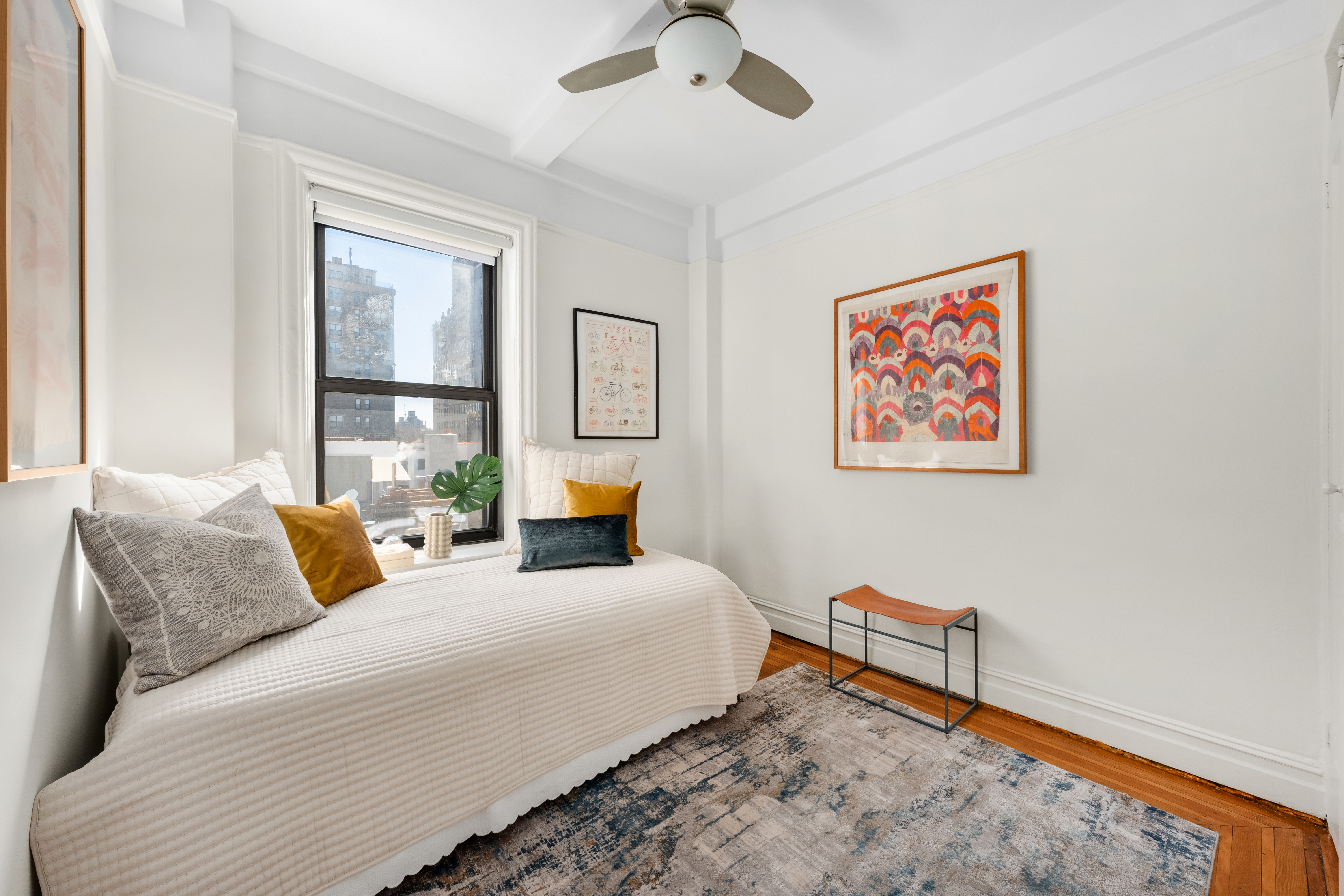 35 West 82nd Street, Unit 8C Manhattan, NY 10024 - Photo 5 of 10 a bedroom with furniture and a window
