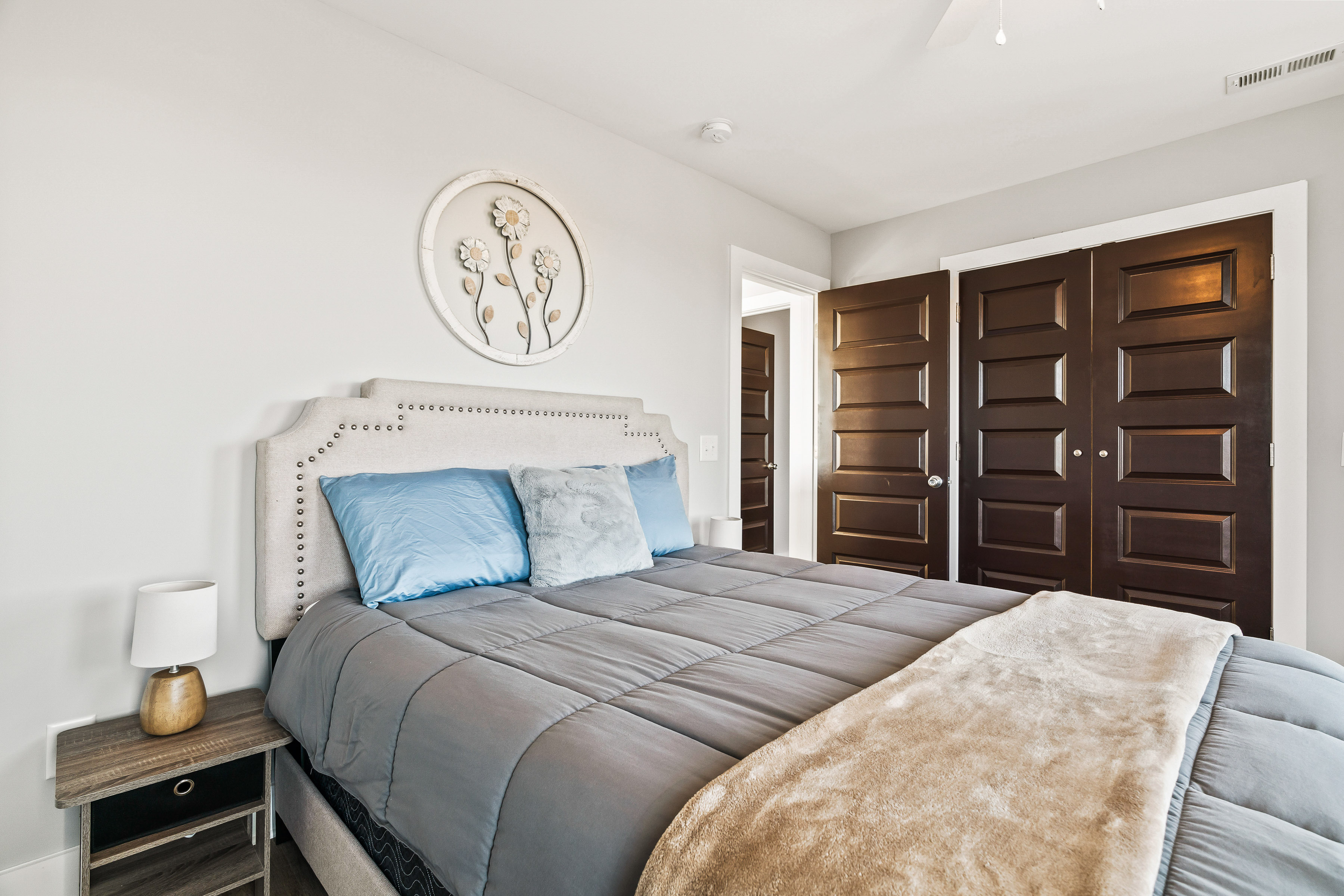 Happy Hollow Road Goodlettsville, TN 37072 - Photo 80 of 203 a bedroom with a large bed and a chandelier