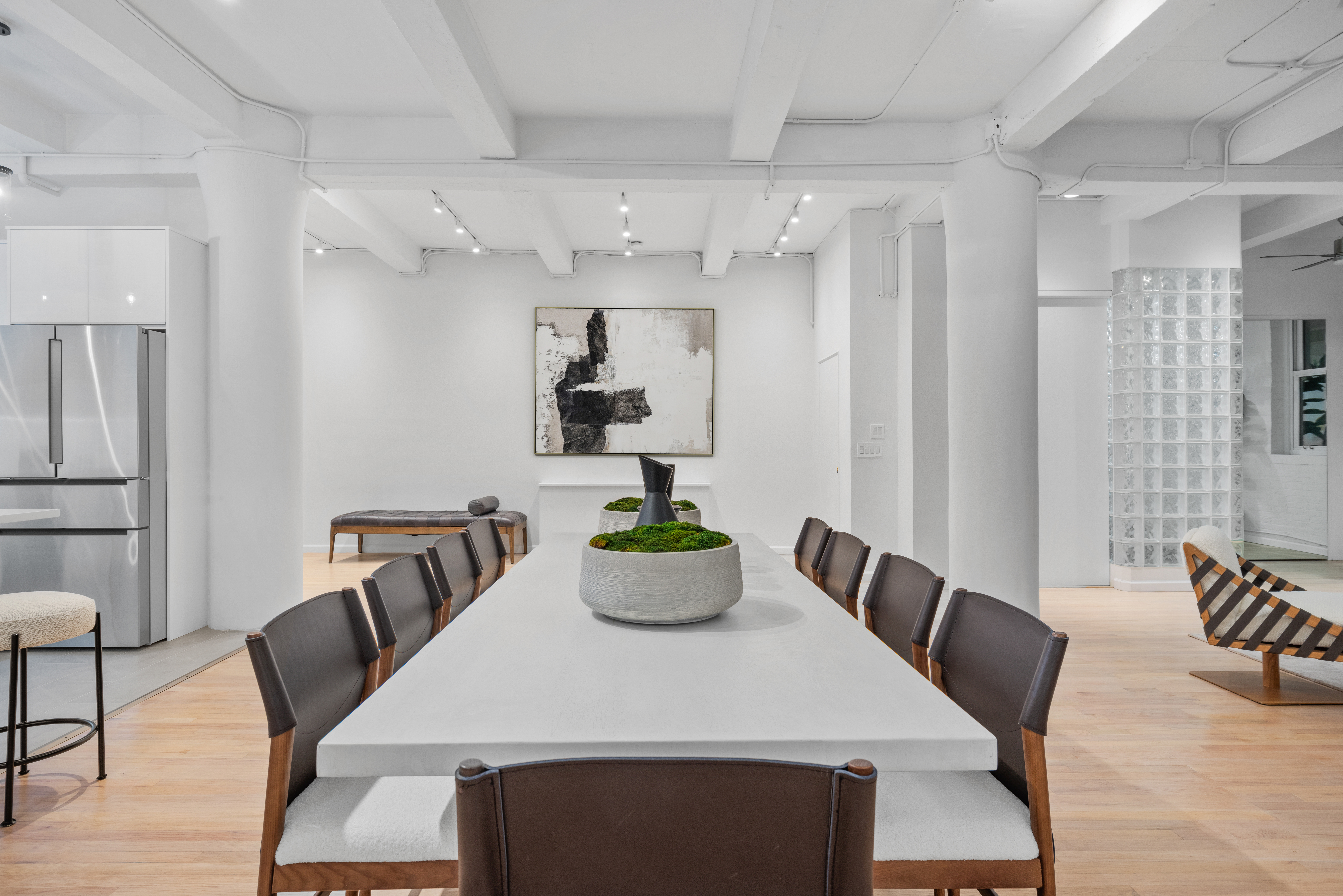 95 Vandam Street, Unit 2R Manhattan, NY 10013 - Photo 8 of 21 a view of a dining room with furniture a rug and wooden floor