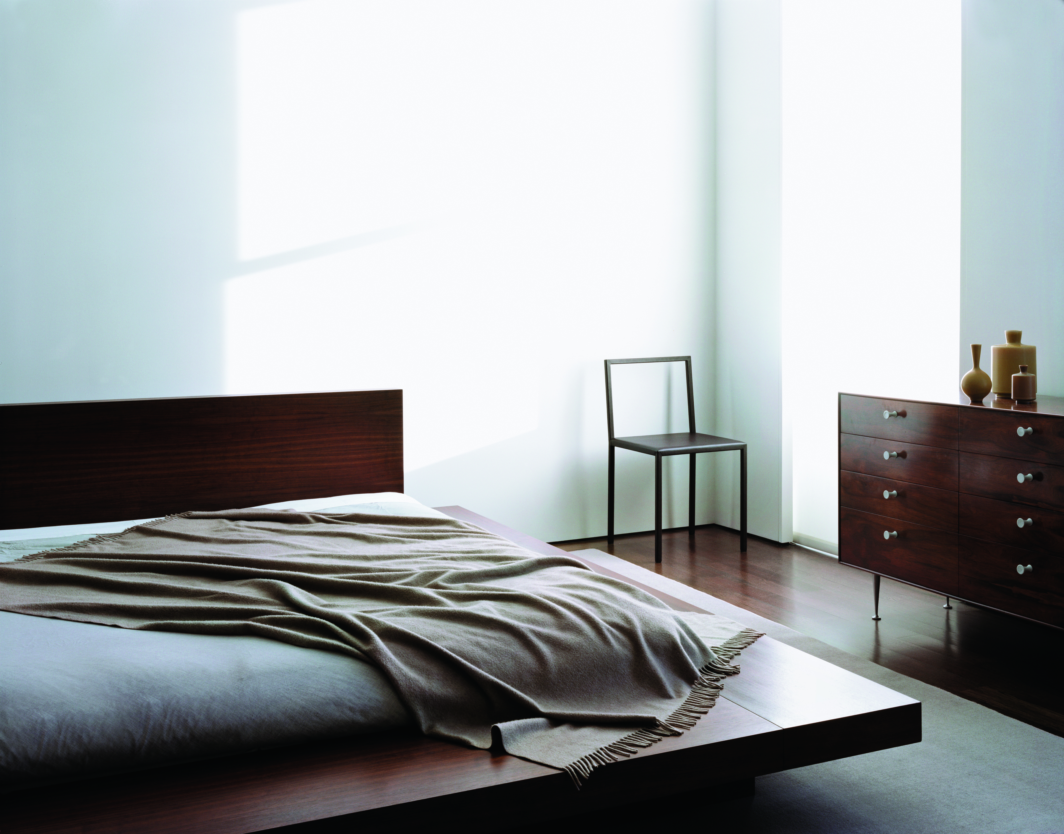 158 Mercer Street, Unit 7MERCER Manhattan, NY 10012 - Photo 7 of 13 a bedroom with a bed and dresser