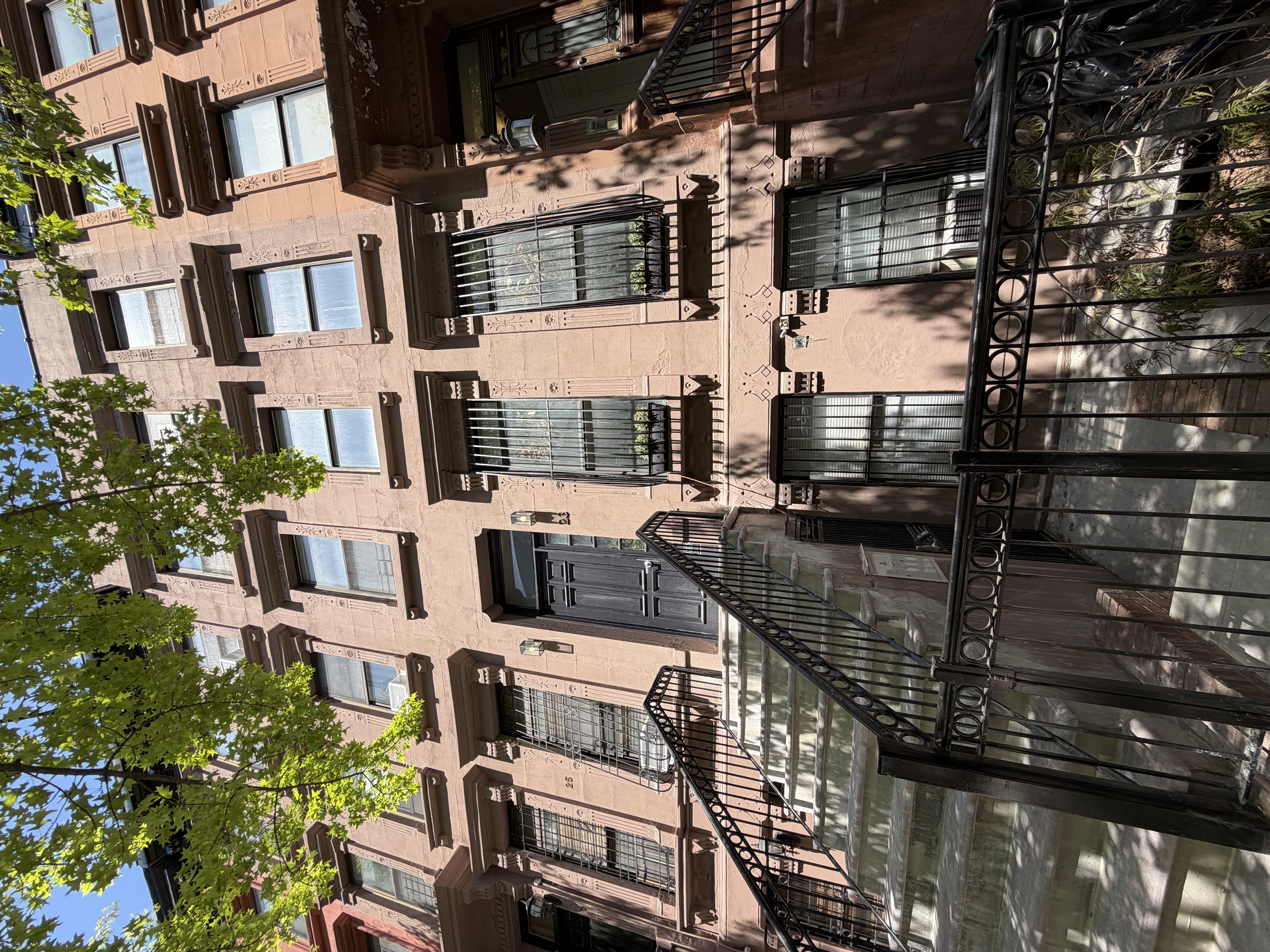 23 West 127th Street, Unit 3 Manhattan, NY 10027 - Photo 10 of 11 an aerial view of a building