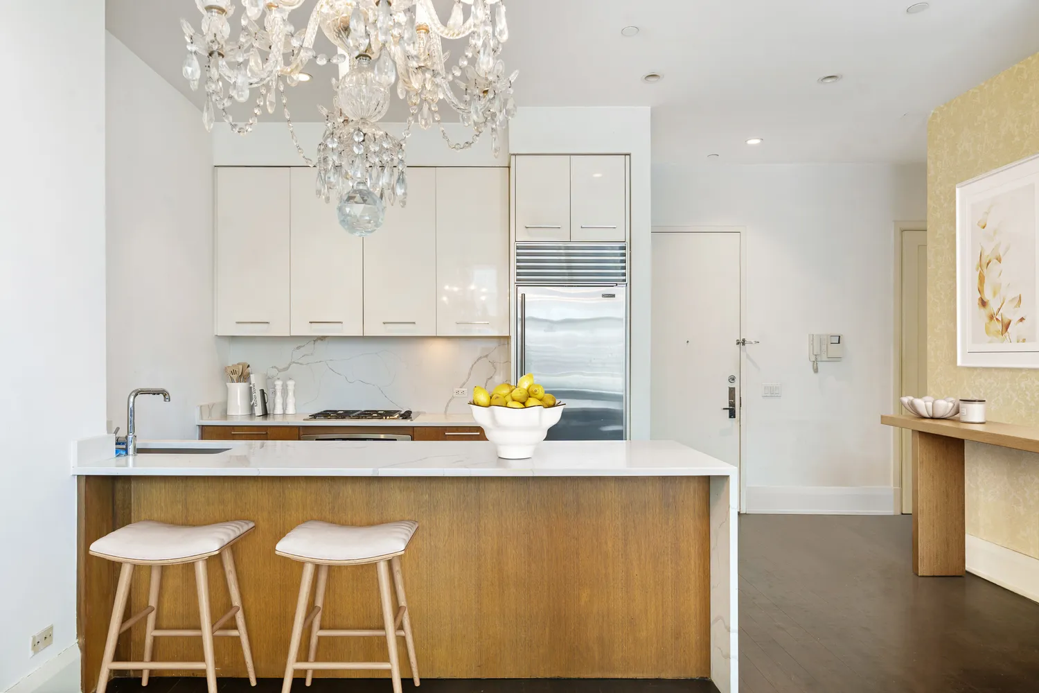 a kitchen with a sink cabinets and window
