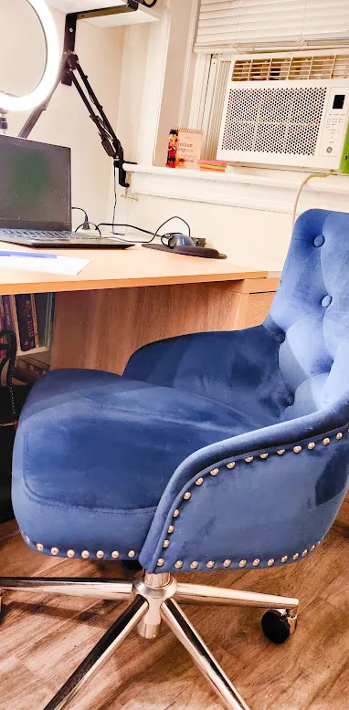 a bedroom with a bed and a mirror