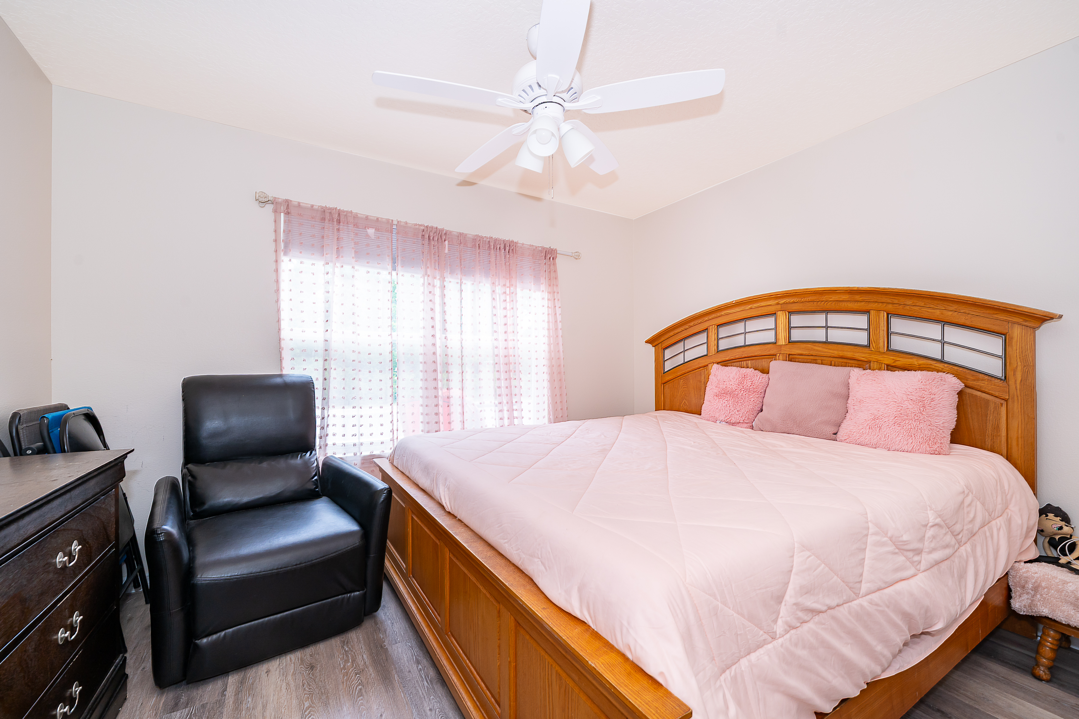1360 Cottage Circle Tavares, FL 32778 - Photo 16 of 25 a bedroom with a bed and window