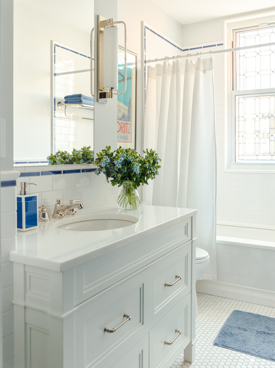 325 West End Avenue, Unit 9C Manhattan, NY 10023 - Photo 12 of 14 a bathroom with a sink and a mirror