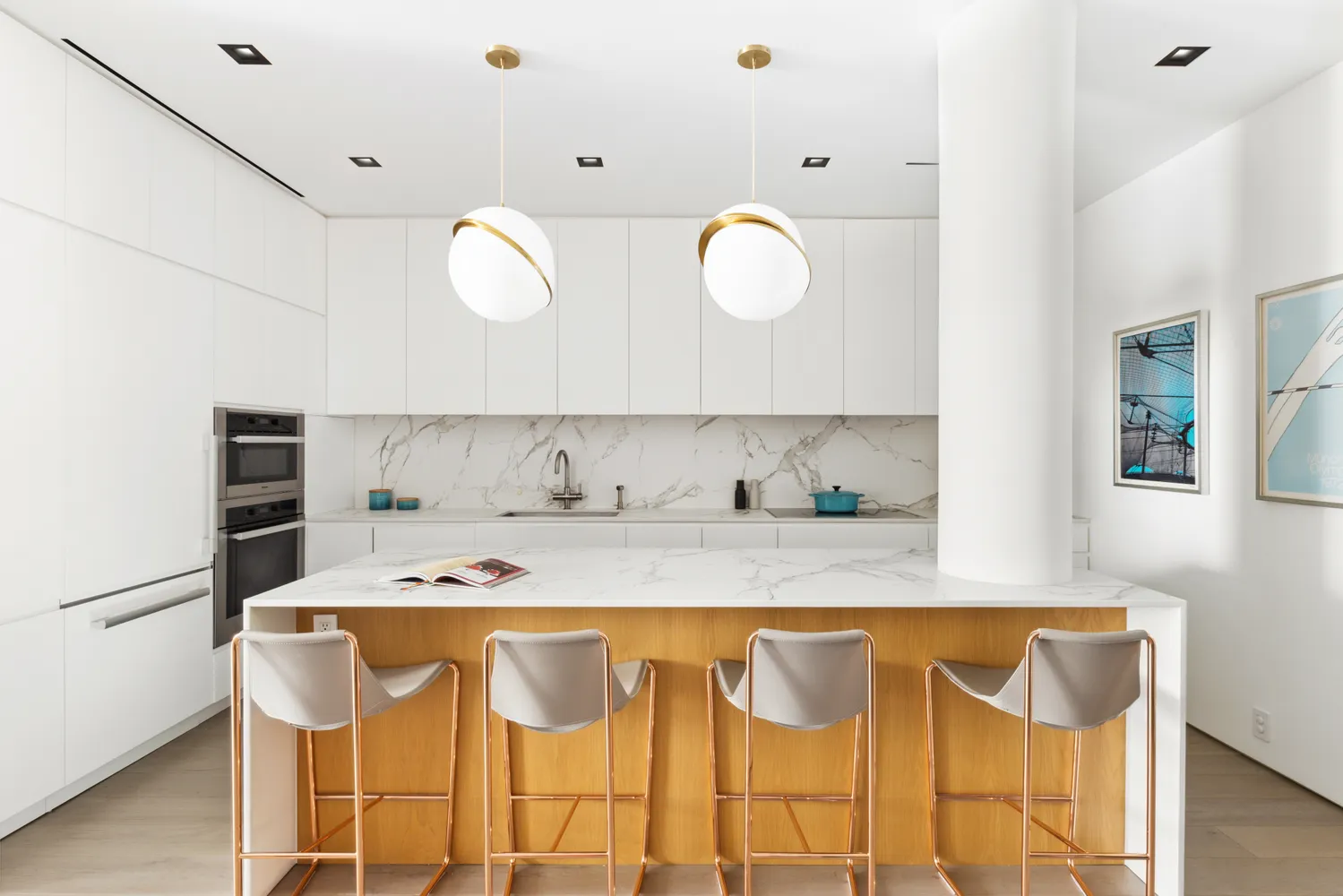 a kitchen with a table chairs and a refrigerator