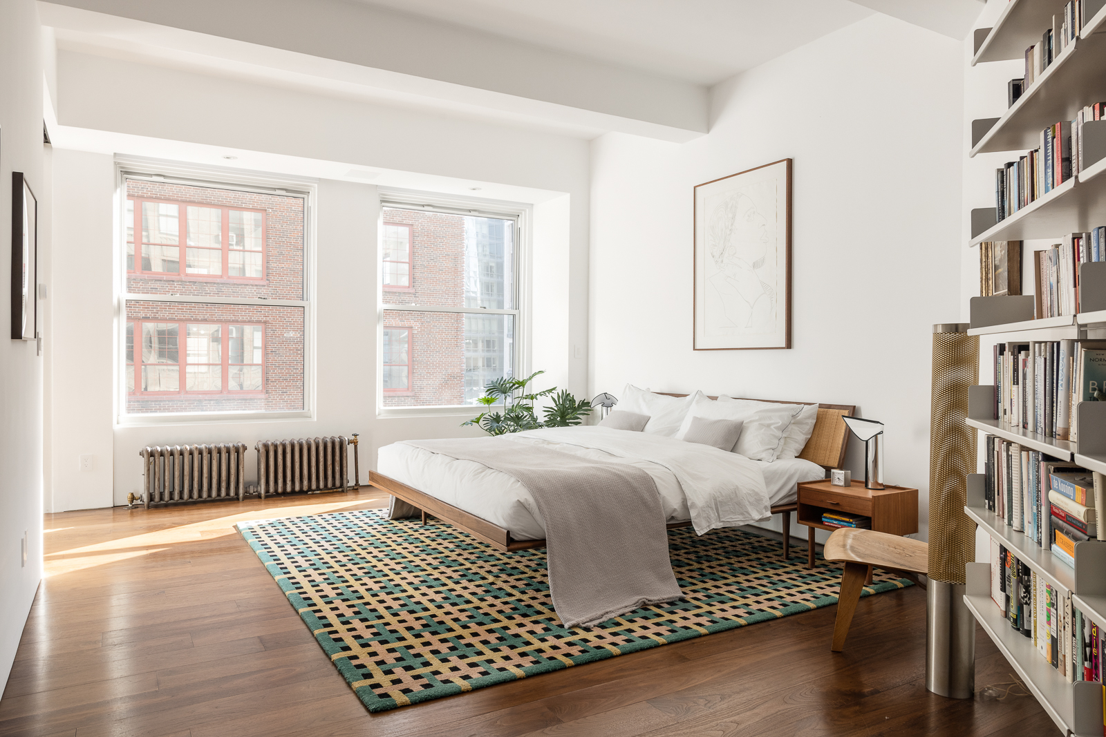 425 Park Avenue South, Unit 14CD Manhattan, NY 10016 - Photo 10 of 17 a bedroom with a bed furniture and a window