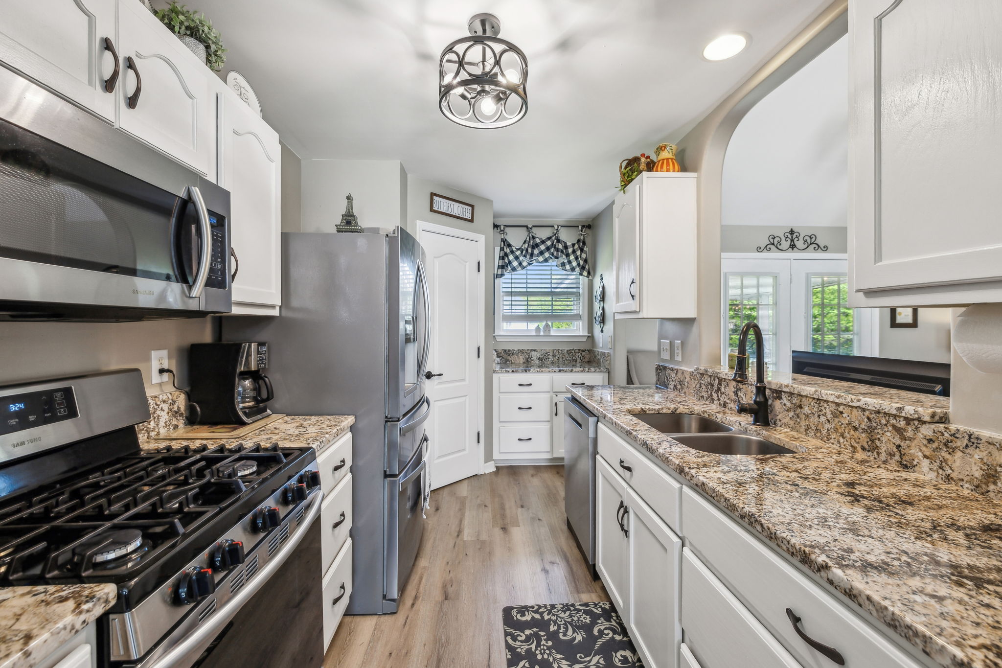 405 Billy Lane Spring Hill, TN 37174 - Photo 18 of 39 a kitchen with stainless steel appliances granite countertop a stove and a refrigerator