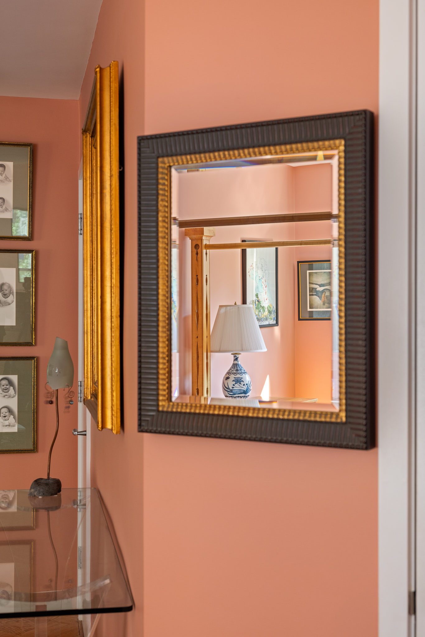 31 Jane Street, Unit 3H Manhattan, NY 10014 - Photo 8 of 14 a view of a hallway with wooden floor and a large mirror