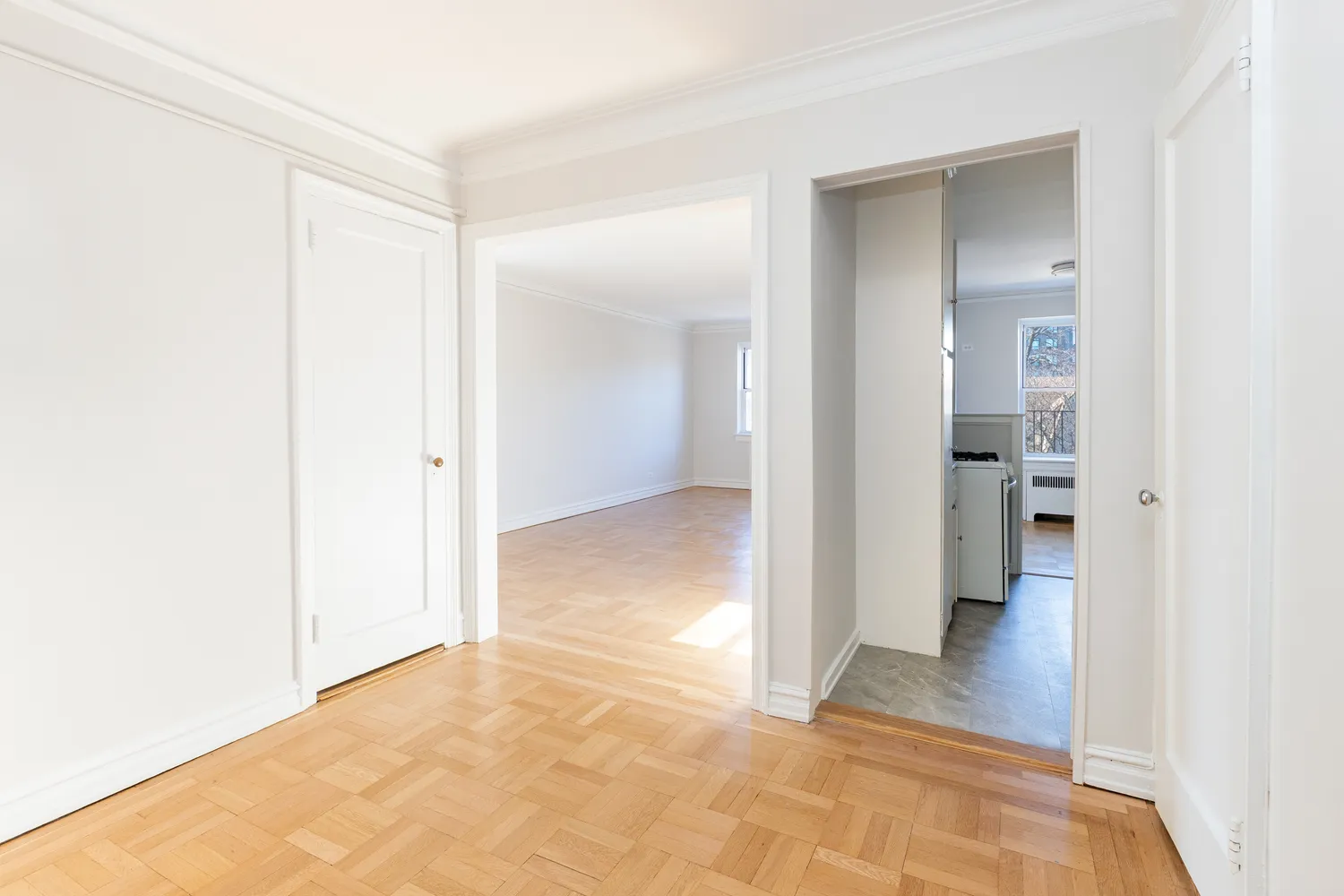 a kitchen with granite countertop a sink stove and refrigerator