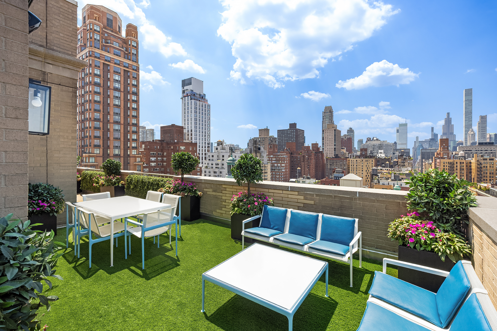 145 East 76th Street, Unit PH Manhattan, NY 10021 - Photo 7 of 25 a view of a chairs and table in the garden