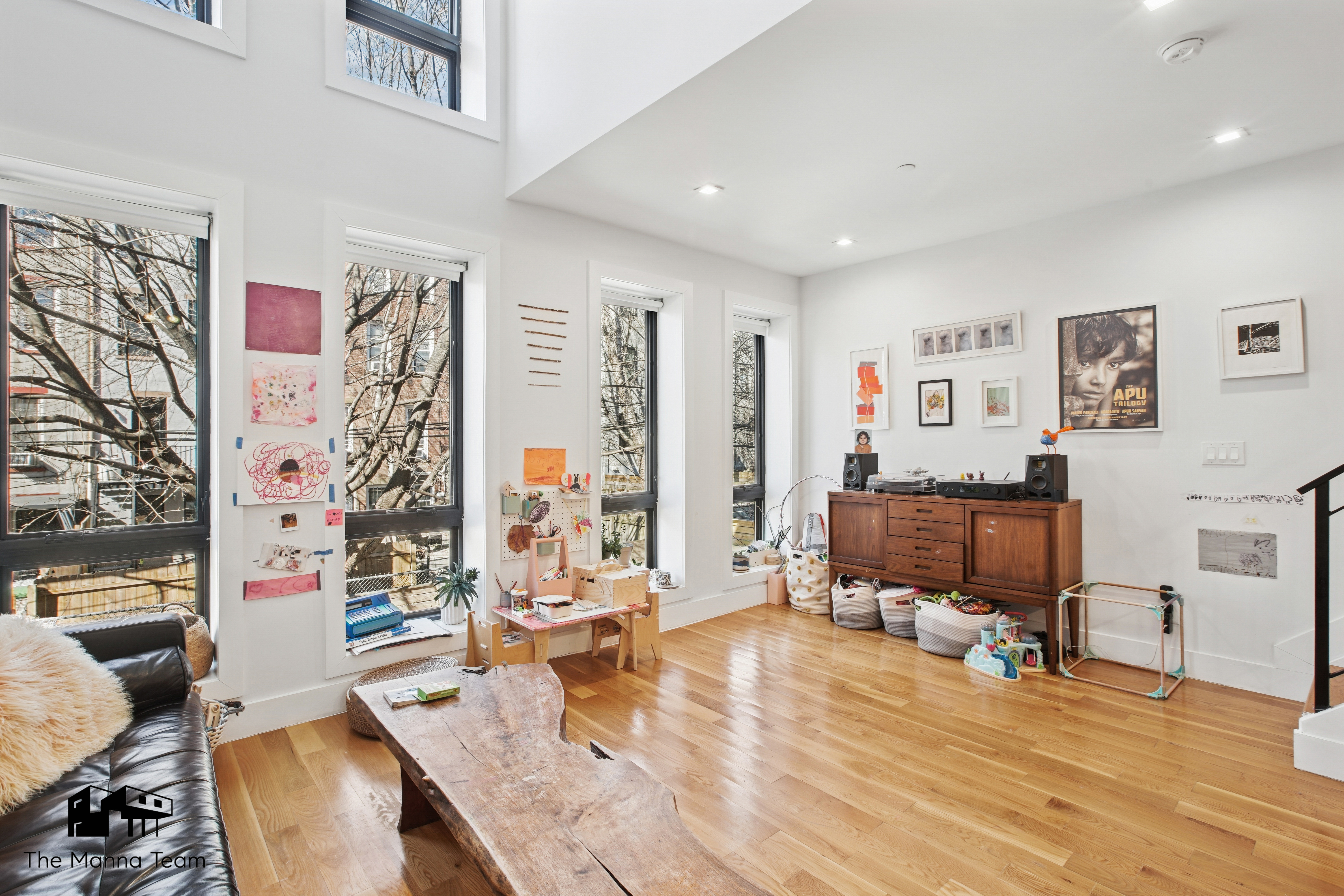 385 Jefferson Avenue, Unit C Brooklyn, NY 11221 - Photo 2 of 21 a living room with furniture and a table