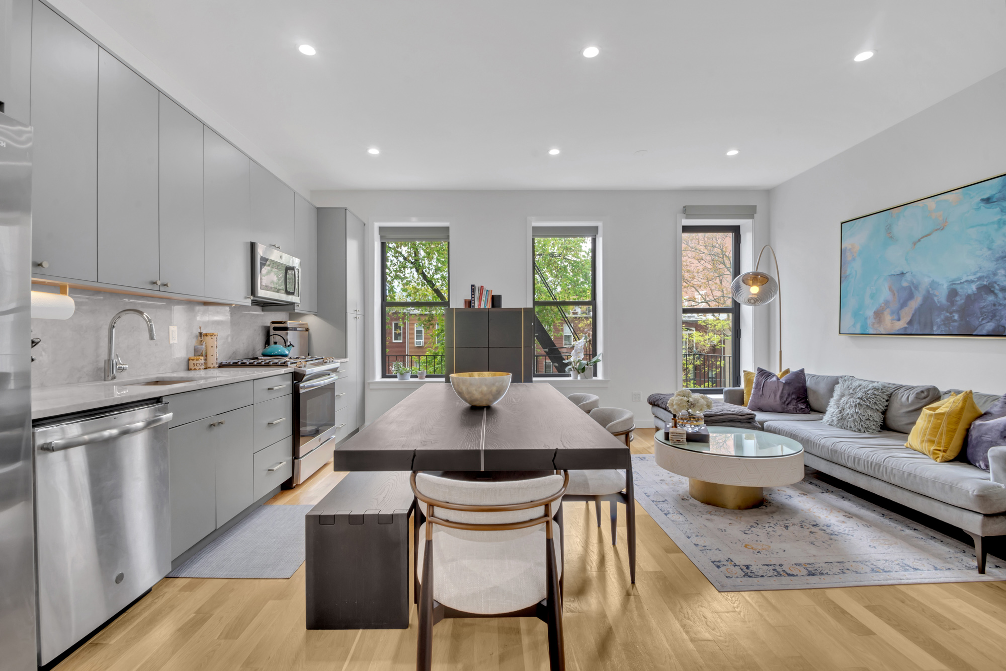 362 13th Street, Unit 3 Brooklyn, NY 11215 - Photo 2 of 13 a large kitchen with a table and chairs