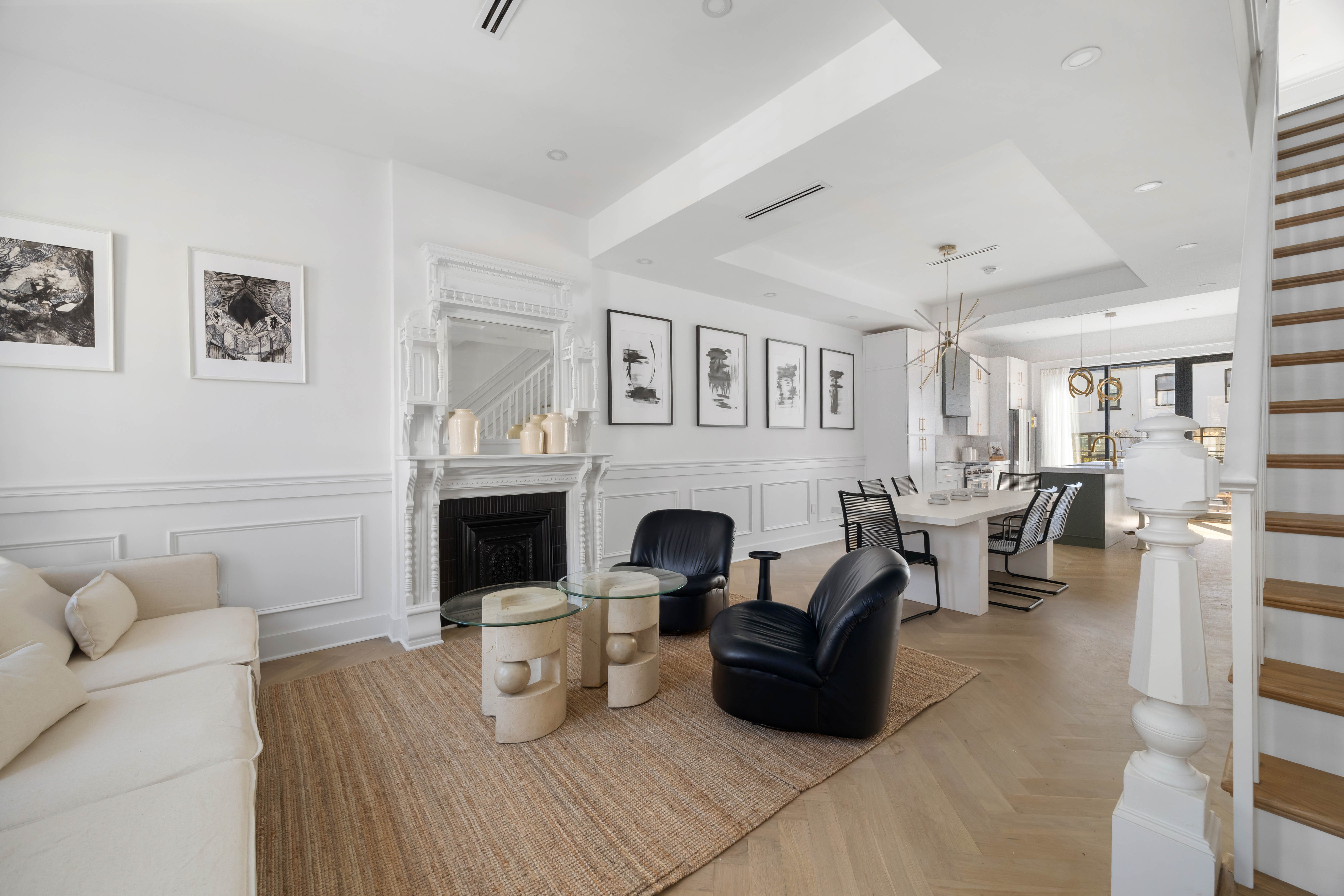 a living room with furniture and fireplace