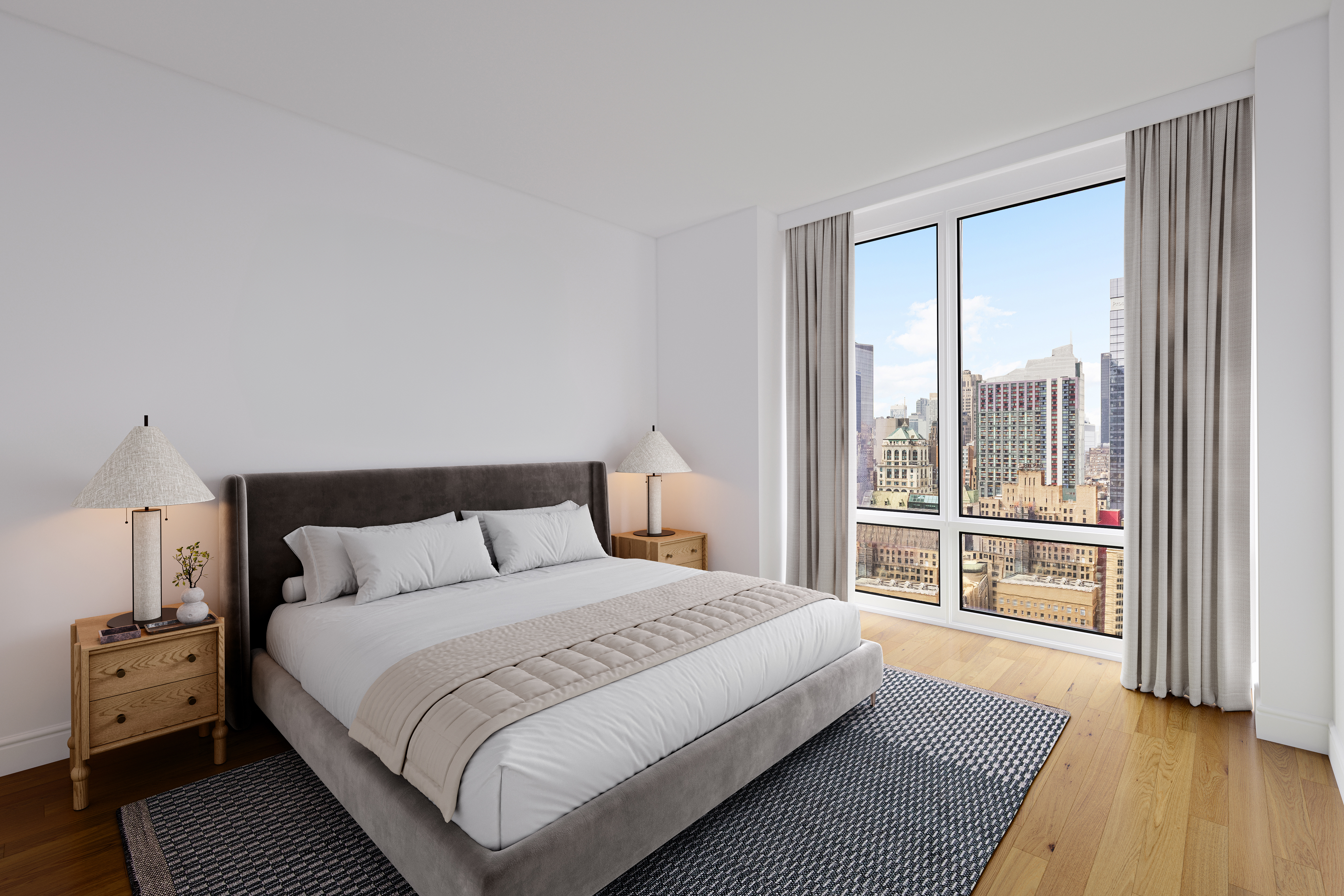 247 West 46th Street, Unit 3103 Manhattan, NY 10036 - Photo 6 of 14 a bedroom with a large bed and a large window