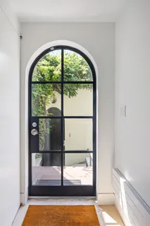 a view of empty room with floor to ceiling window