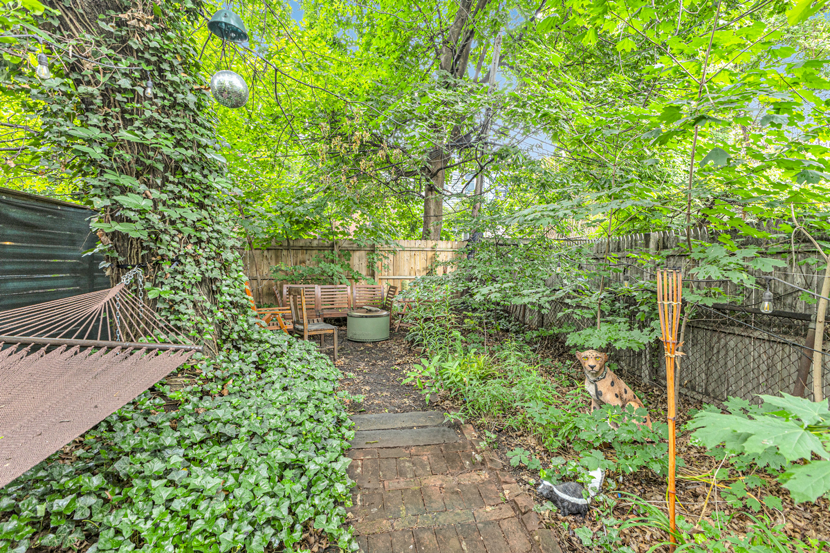 116 Ryerson Street Brooklyn, NY 11205 - Photo 14 of 16 a backyard of a house with lots of green space