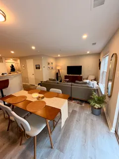 a room with furniture and wooden floor