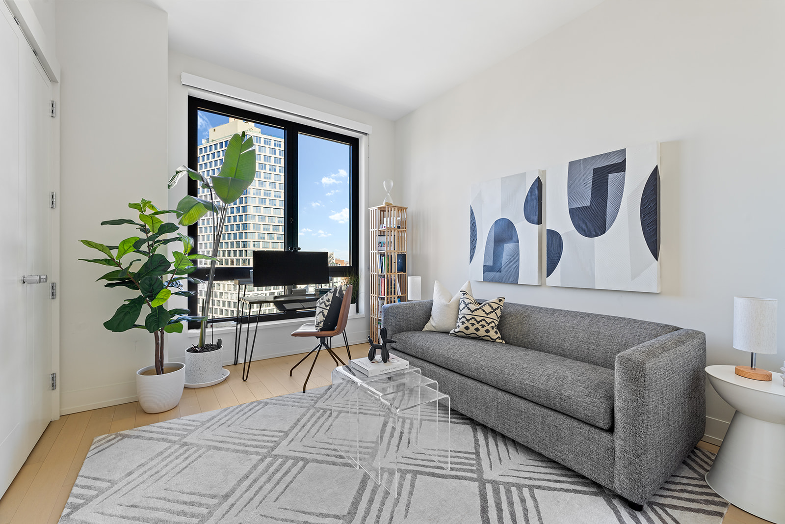 550 Vanderbilt Avenue, Unit 1402 Brooklyn, NY 11238 - Photo 8 of 17 a living room with furniture and a large window