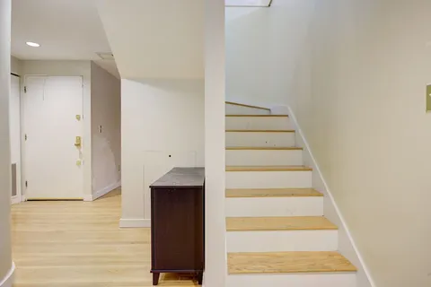 a view of staircase with white walls and white walls