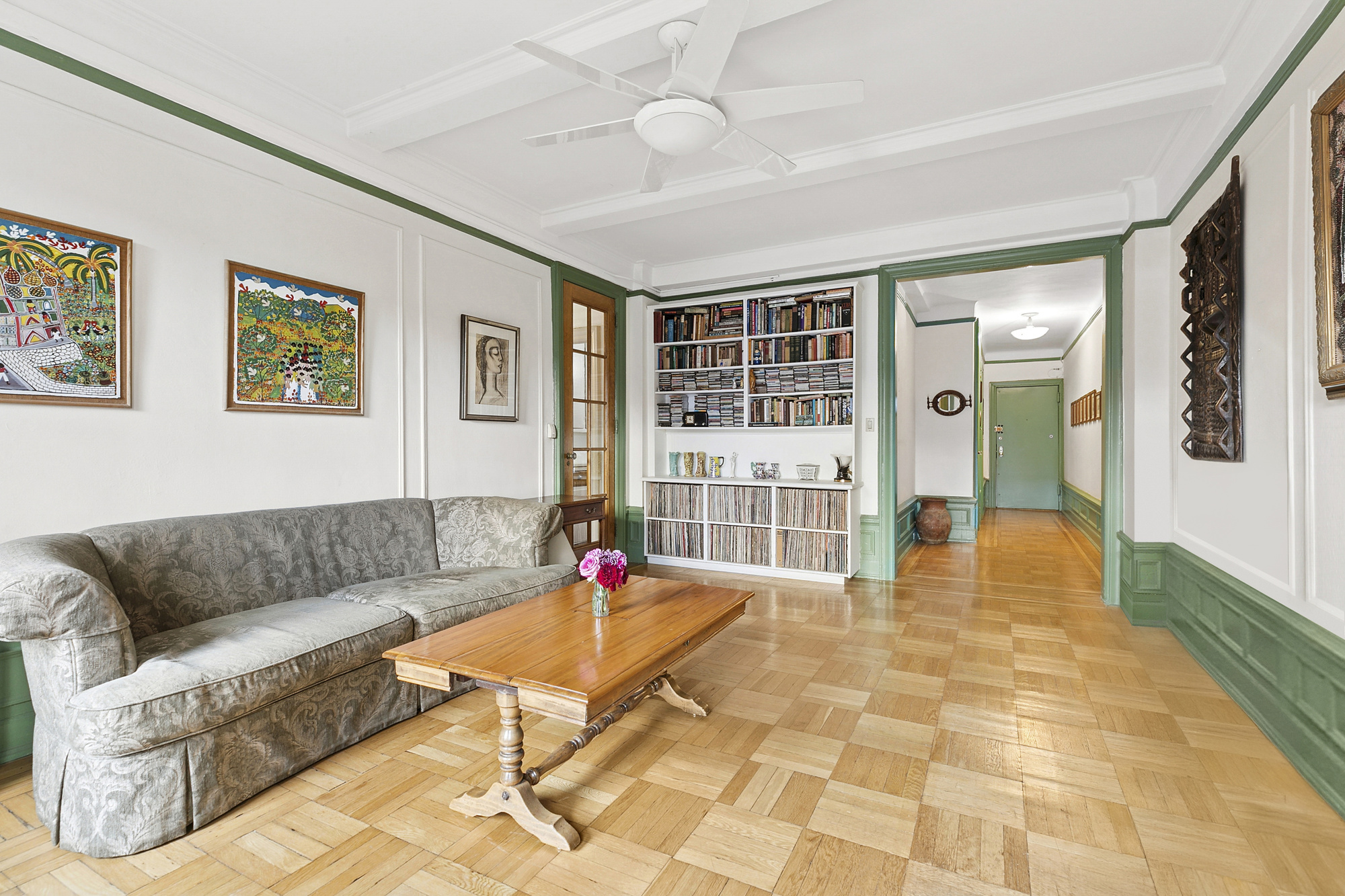 160 West 95th Street, Unit 4A Manhattan, NY 10025 - Photo 1 of 10 a living room with furniture and dining table