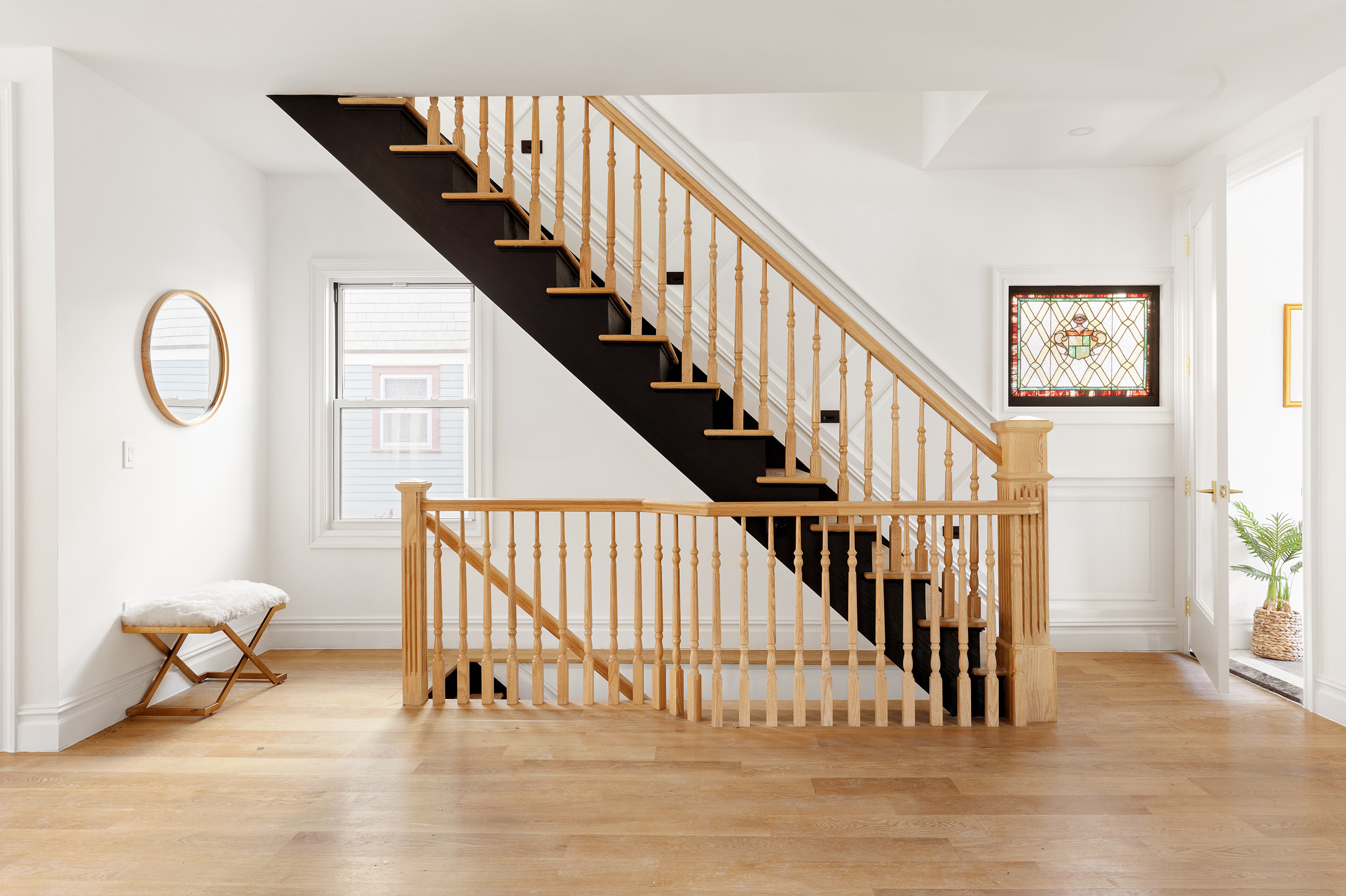 728 Westminster Road, Unit TWNHS Brooklyn, NY 11230 - Photo 11 of 23 a view of entryway with wooden floor and stairs