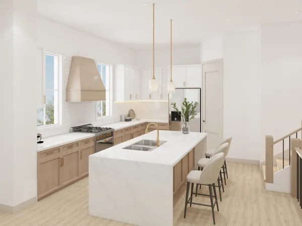 a kitchen that has a sink a table and chairs in it