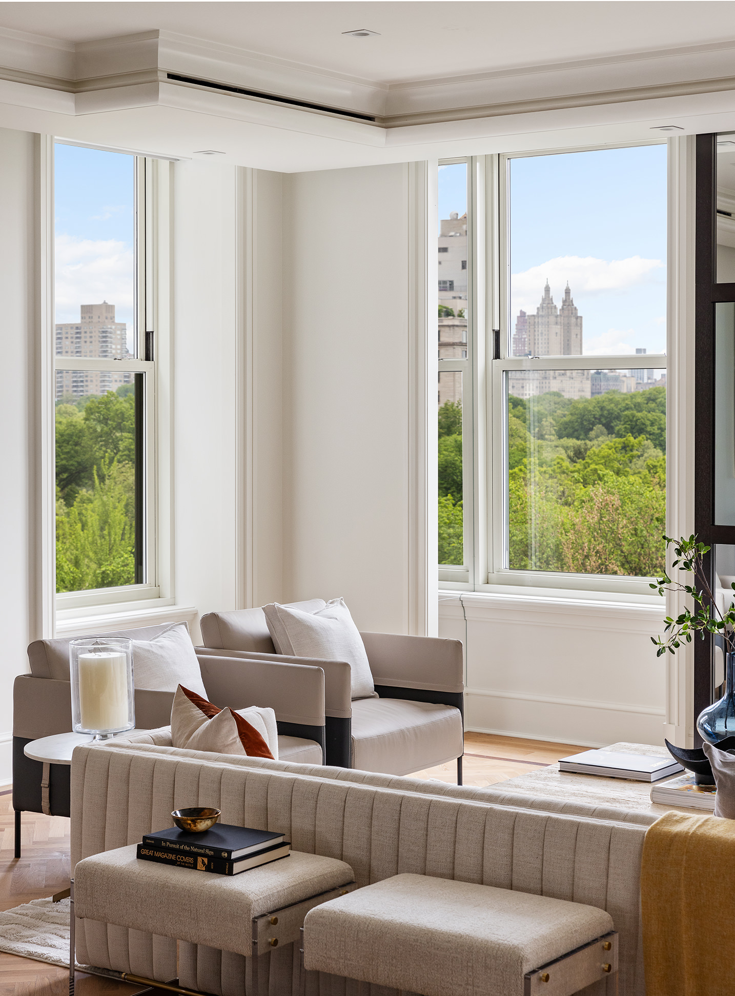 1 Central Park South, Unit 8010203 Manhattan, NY 10019 - Photo 10 of 45 a living room with furniture and a large window
