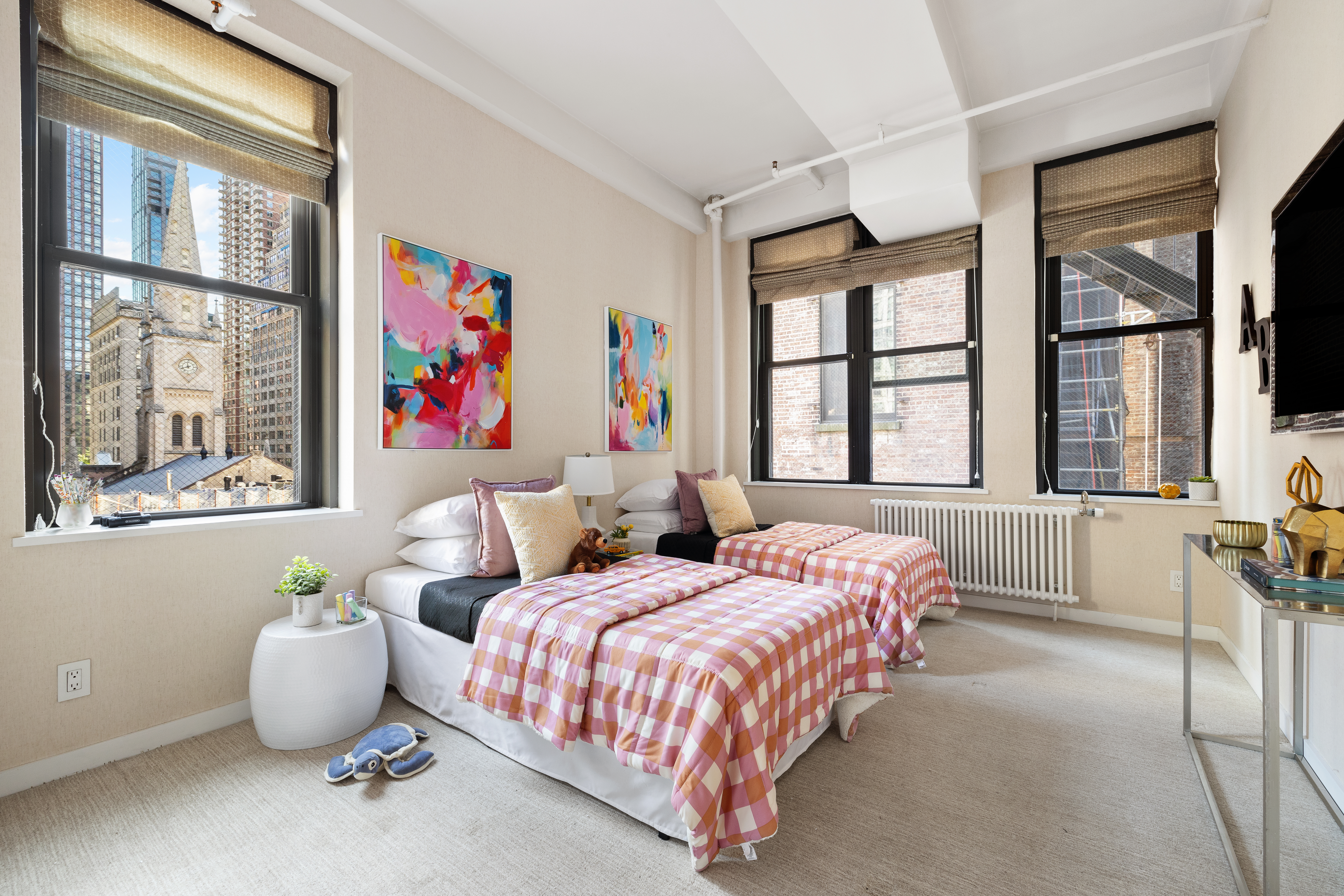 24 West 30th Street, Unit 6 Manhattan, NY 10001 - Photo 9 of 14 a bedroom with a bed and large window