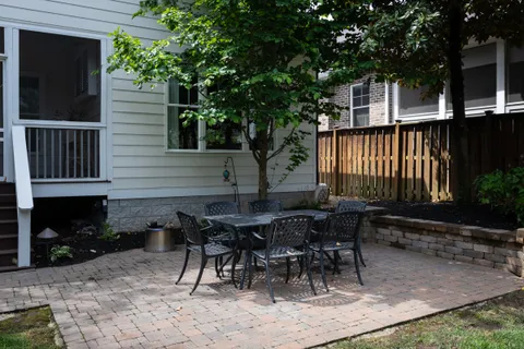 a view of front door with a deck