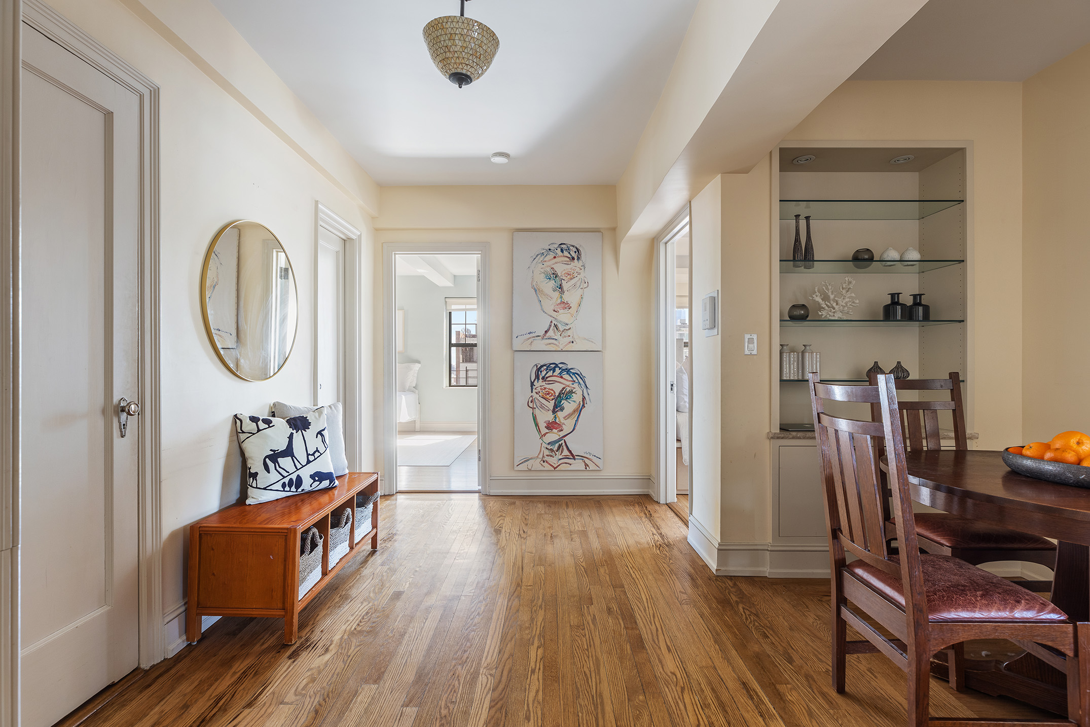 200 East 16th Street, Unit 19D Manhattan, NY 10003 - Photo 6 of 14 a living room with furniture and a wooden floor