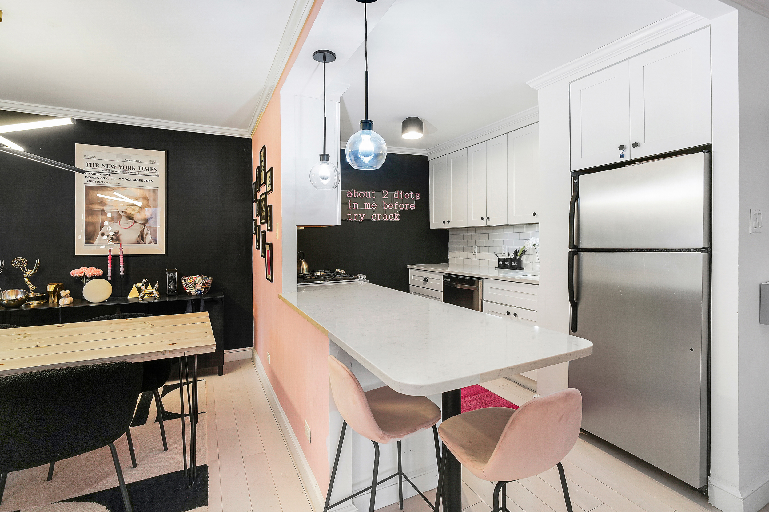 330 3rd Avenue, Unit 15G Manhattan, NY 10010 - Photo 6 of 14 a kitchen with stainless steel appliances granite countertop a sink refrigerator and cabinets