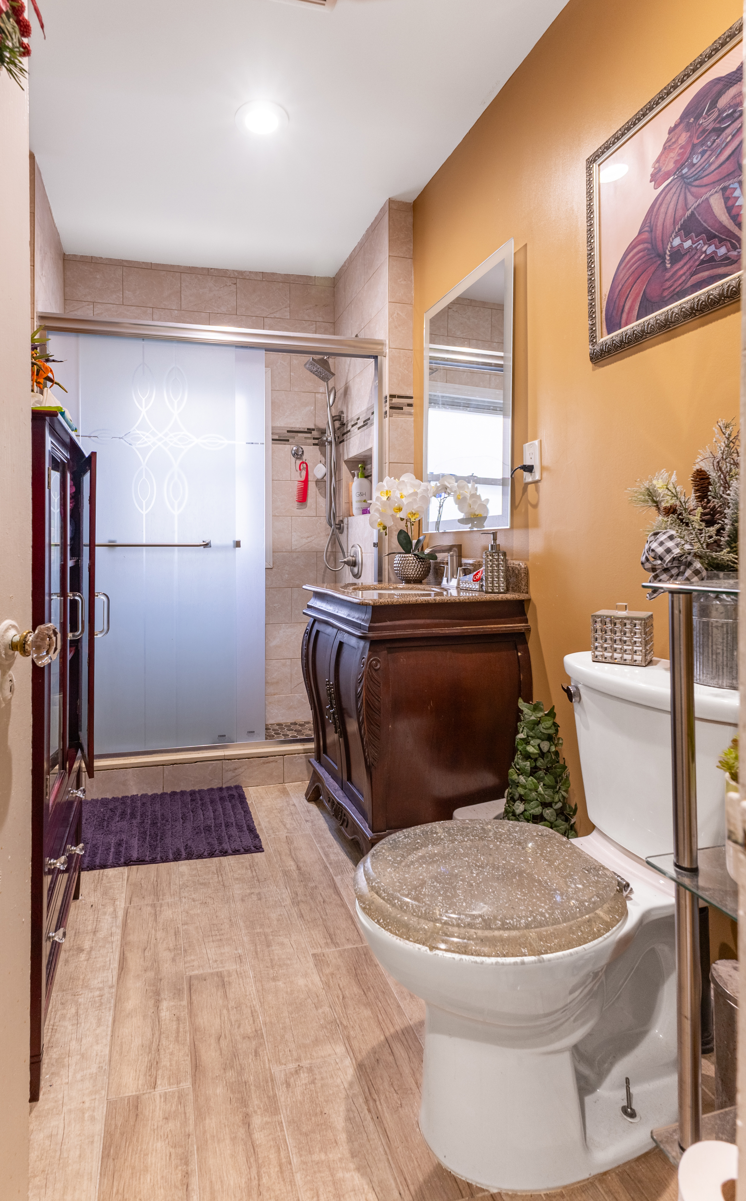 961 East 32nd Street Brooklyn, NY 11210 - Photo 12 of 24 a bathroom with a toilet sink and mirror