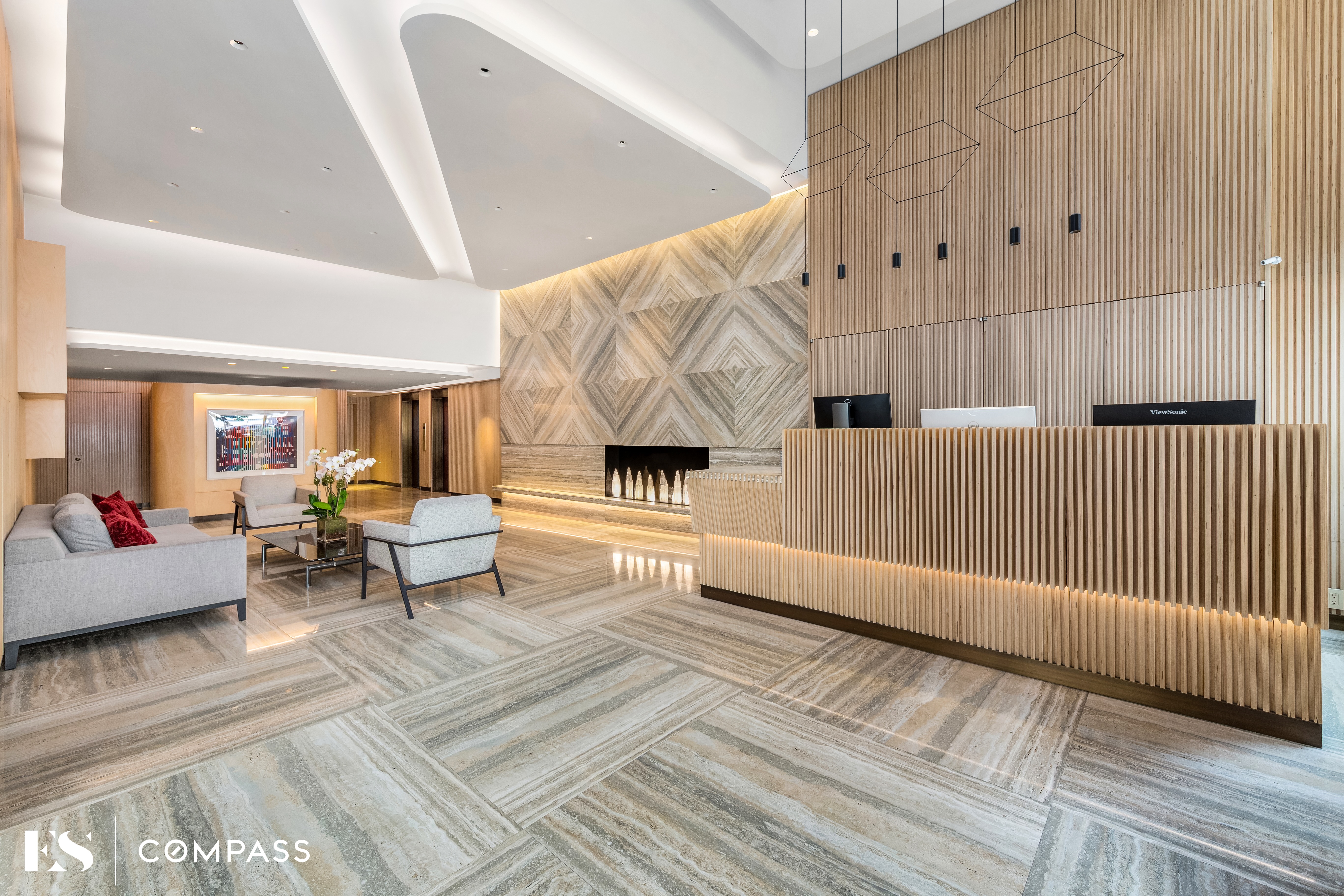 700 Park Avenue, Unit 2B Manhattan, NY 10021 - Photo 20 of 26 a living room with furniture and wooden floor