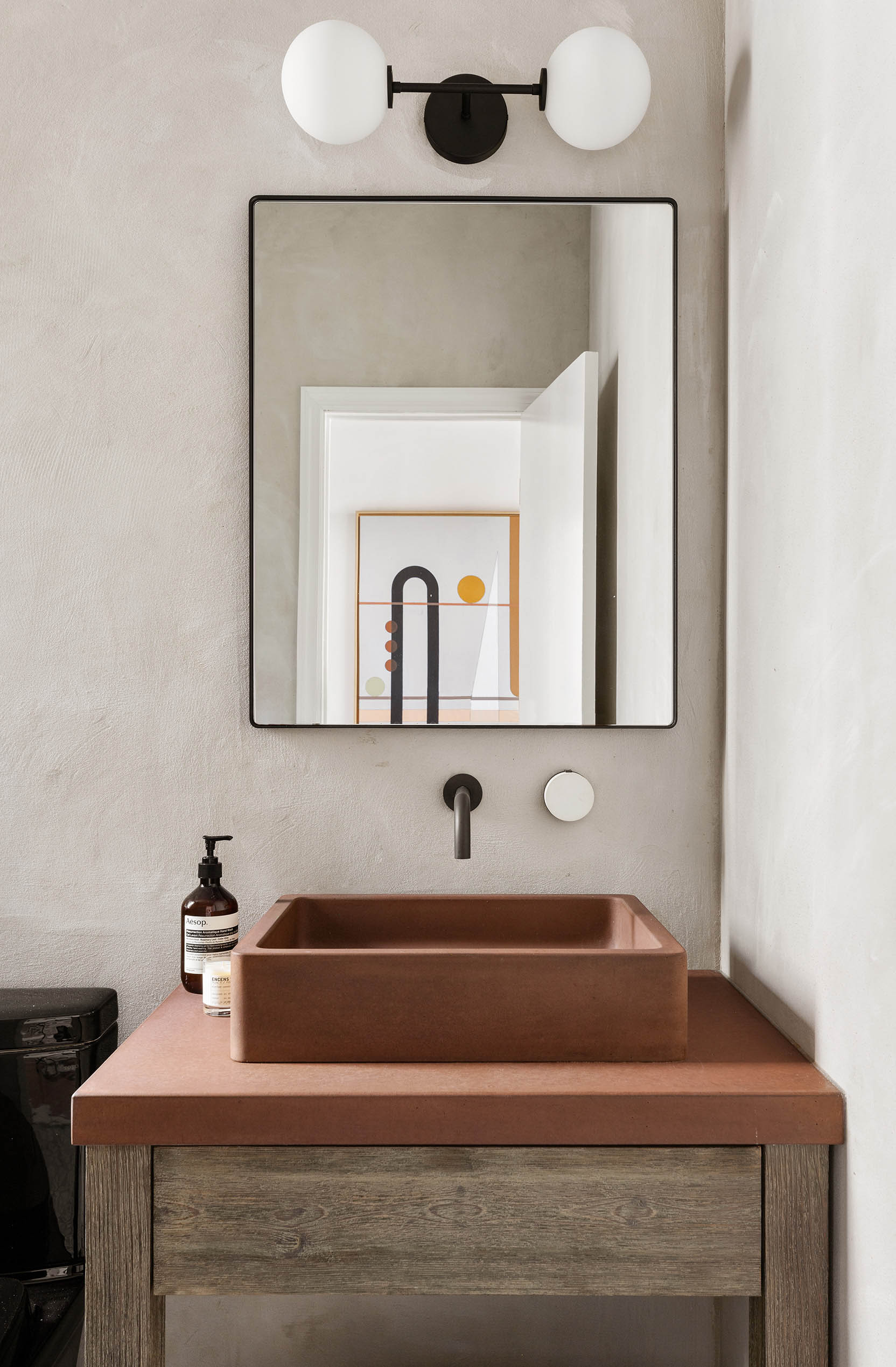 84 Forsyth Street, Unit 5R Manhattan, NY 10002 - Photo 13 of 14 a bathroom with a sink and a mirror