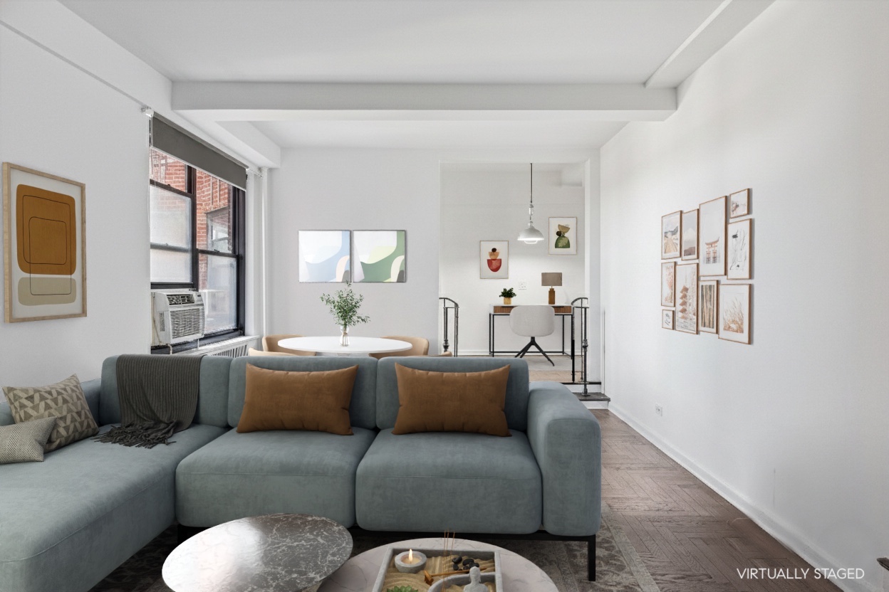 70 Park Terrace West, Unit E74 Manhattan, NY 10034 - Photo 5 of 27 a living room with furniture and a large window