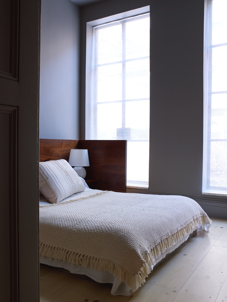125 West 15th Street Manhattan, NY 10011 - Photo 13 of 28 a bedroom with a bed and window