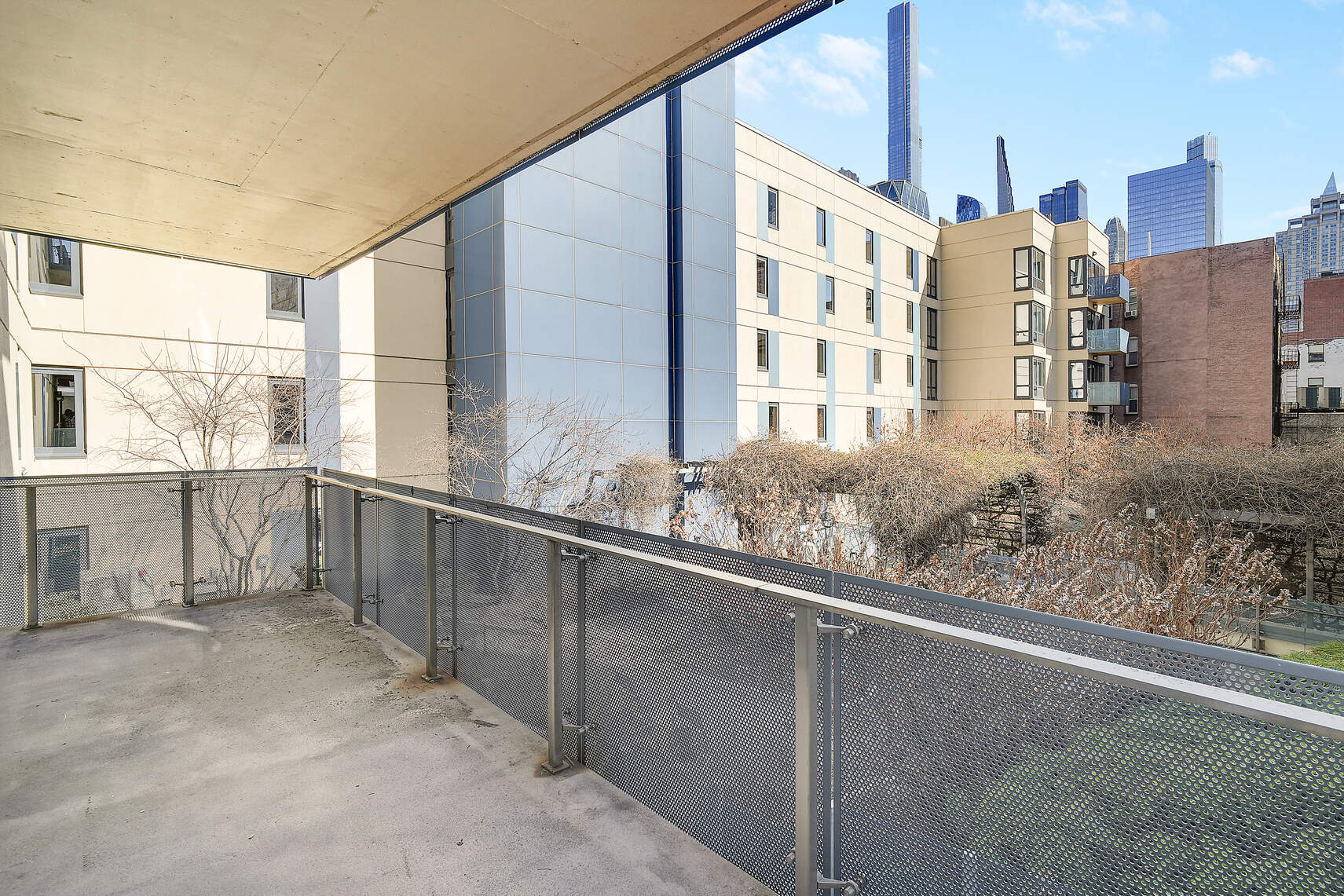 454 West 54th Street, Unit 3A Manhattan, NY 10019 - Photo 5 of 13 a view of a building from the balcony