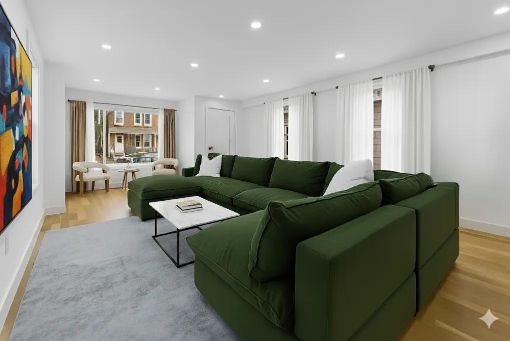 a living room with furniture and a window